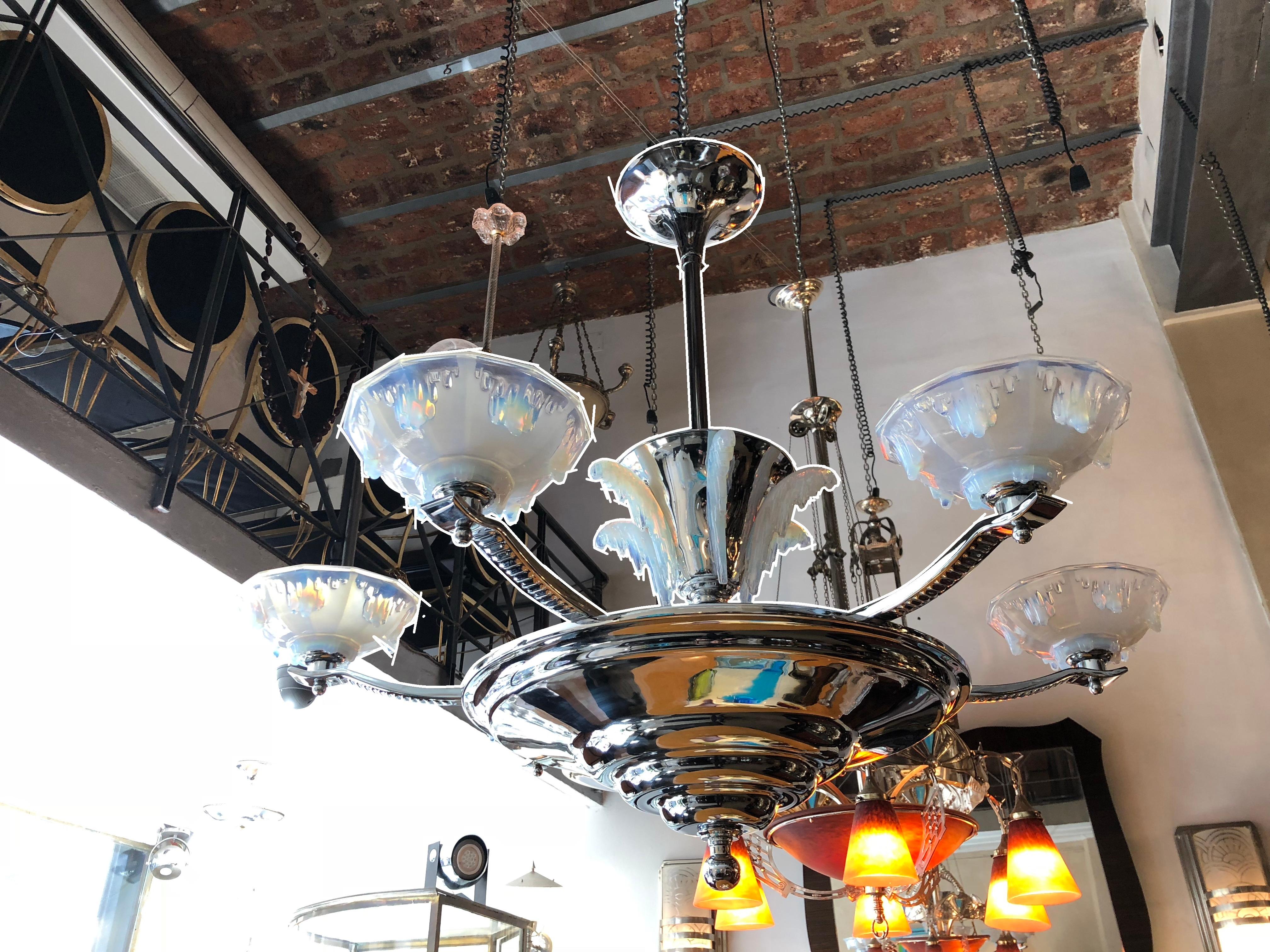 Hanging lamp.

Material: Chromed and Art glass.
Style: Art Deco.
Country: France.
To take care of your property and the lives of our customers, the new wiring has been done.
If you are looking for sconces to match your ceiling lighting, we have what
