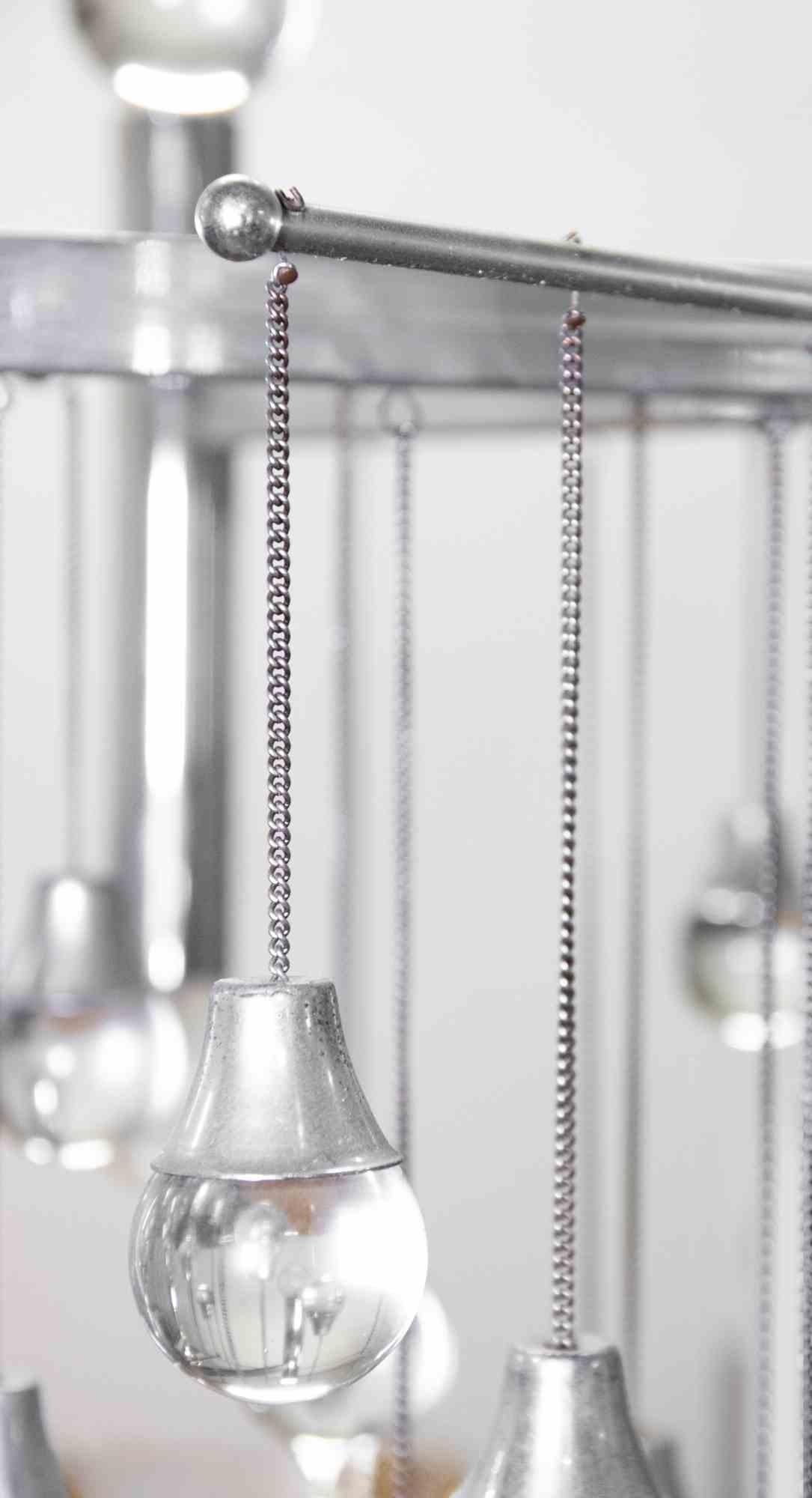 Chandelier Lamp ist eine Designleuchte, die von Gaetano Sciolari in den 1970er Jahren entworfen wurde.

Glas und verchromtes Metall

Gute Bedingungen.

Angelo Gaetano Sciolari (1927-1994) war Inhaber von Sciolari Lighting und in den 1950er Jahren