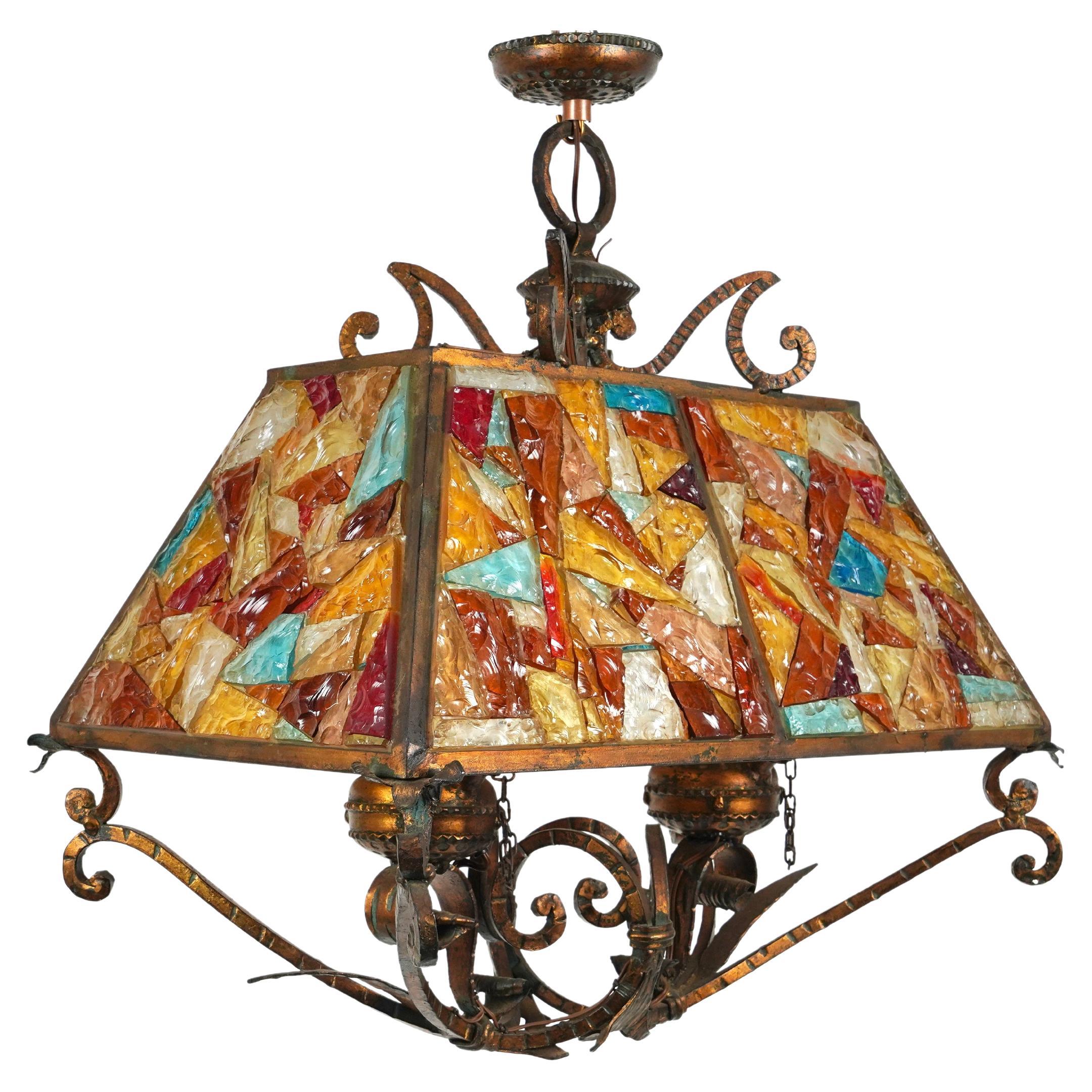 Amazing large Midcentury chandelier / lantern in colored bronze wrought iron and multi-color hammered glass produced by Longobard the concurrent of Poliarte at the 1960s / 1970s. 

Made in Italy in the 1970s. 

It uses 2 bulbs.