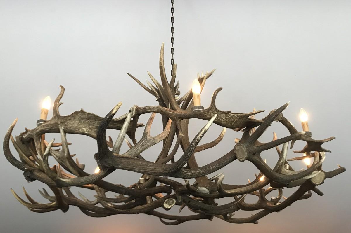 Chandelier made of antlers (HG 222-E). The chandelier is made of fallow deer and red stag antler. We can make any antler chandelier entirely according to your wishes.