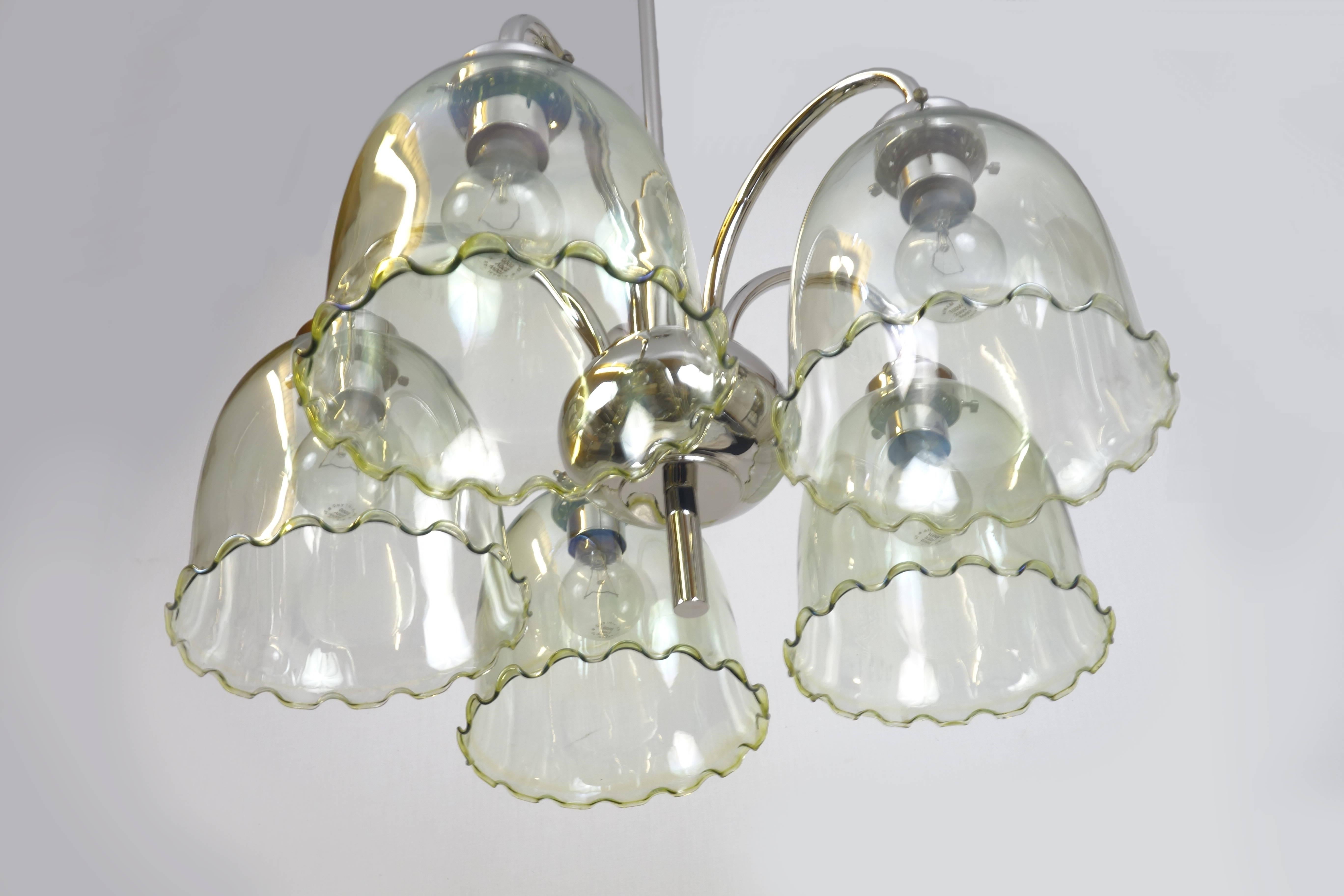 Impressive and unique Italian chandelier of the 1930s in stunning condition. This object has been disassembled completely. The nickel-plated aluminum parts were high gloss polished and finally the object has been newly electrified according to