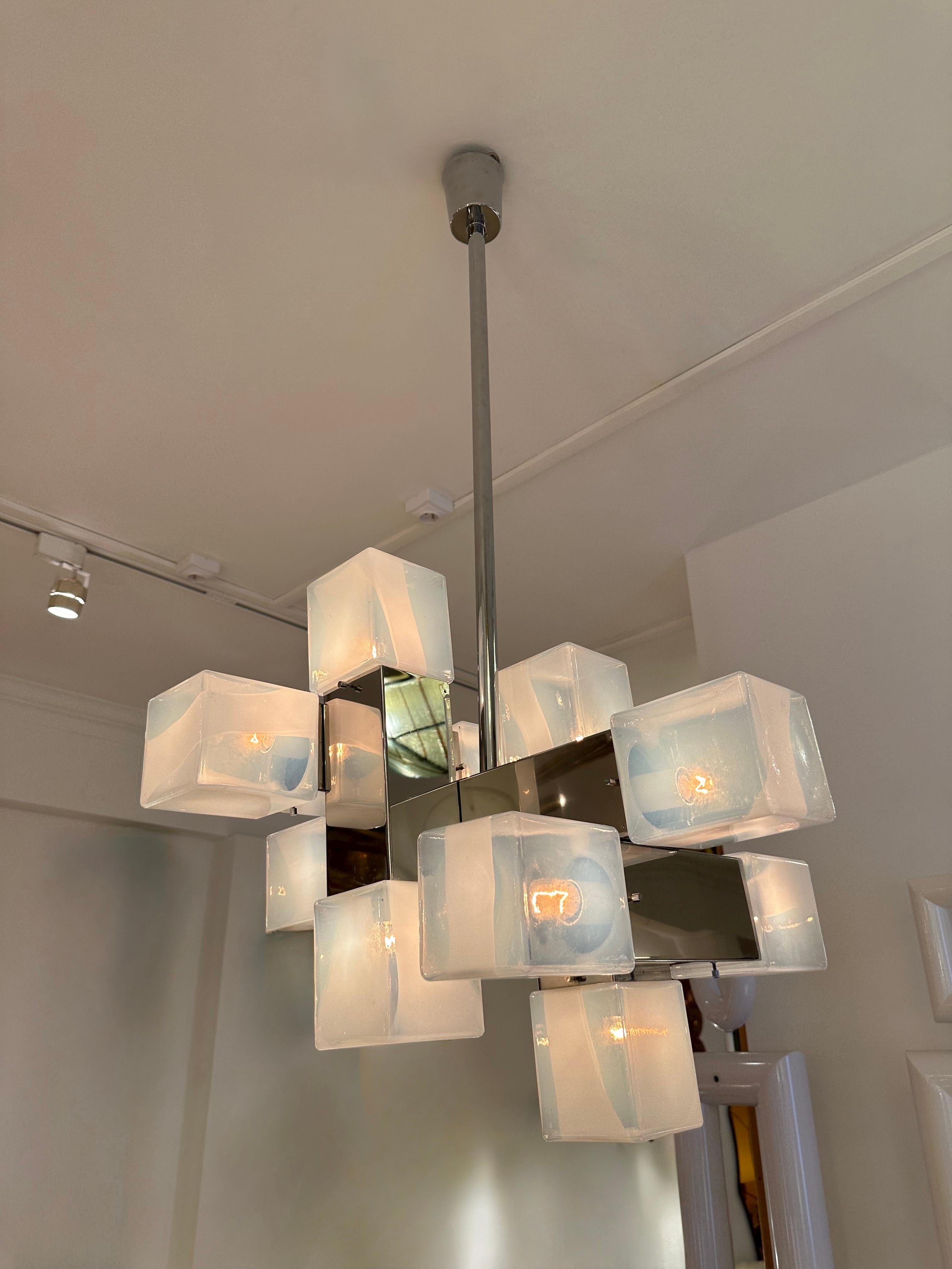 Chandelier ceiling pendant light lightning lamp blue opal Murano glass cube and metal chrome by the manufacture Mazzega. Famous design like Venini, Vistosi, La Murrina, Poliarte, Carlo Aldo Nason, Toni Zuccheri.