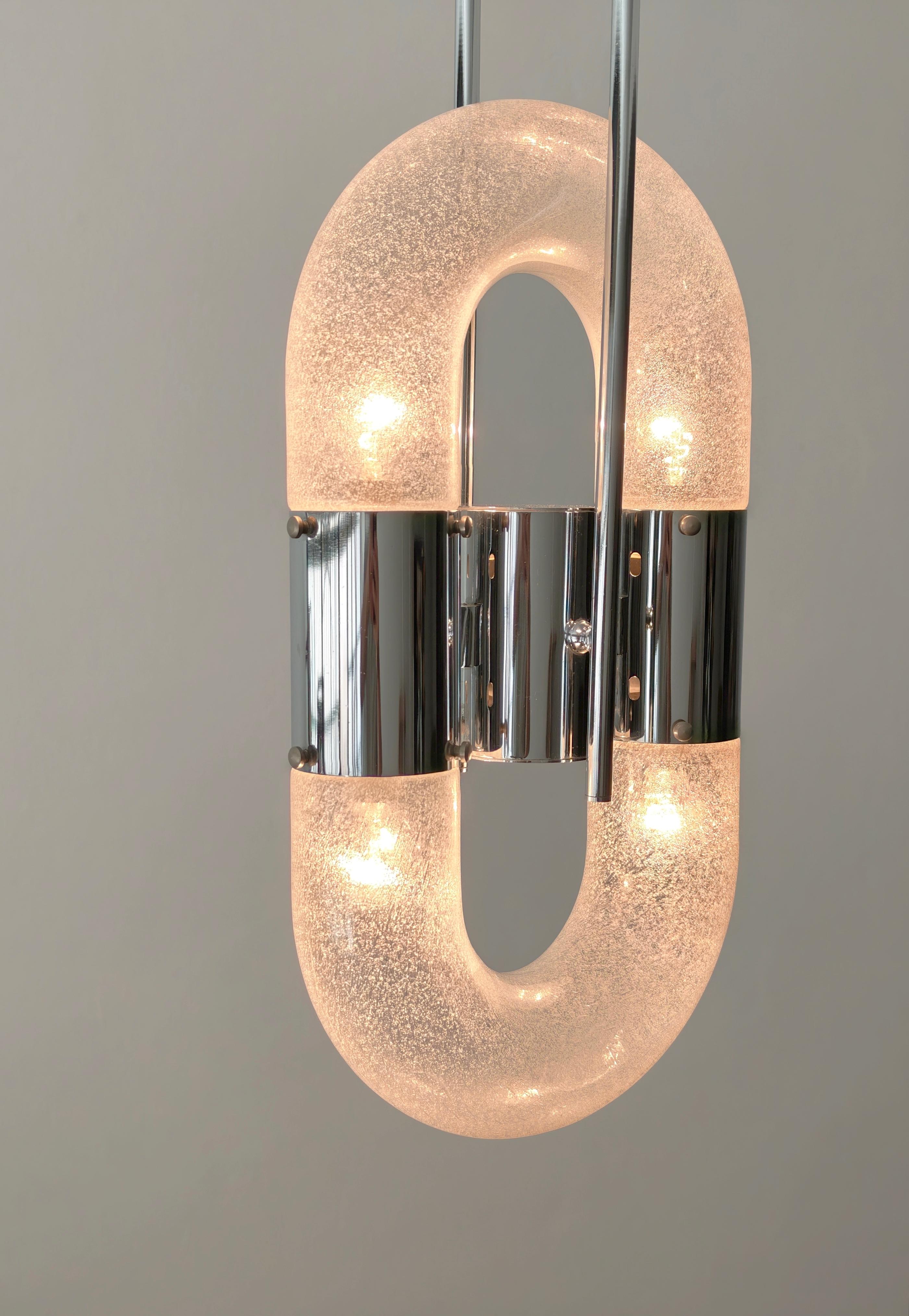 Aldo Nason. Produzione Mazzega, Italia 1970 ca.
Lámpara de sobremesa de cuatro luces con estructura de metal cromado, difusor cilíndrico curvado en vidrio brillante. Este tipo de iluminación es cada vez más raro de encontrar. Excelente. Por favor,