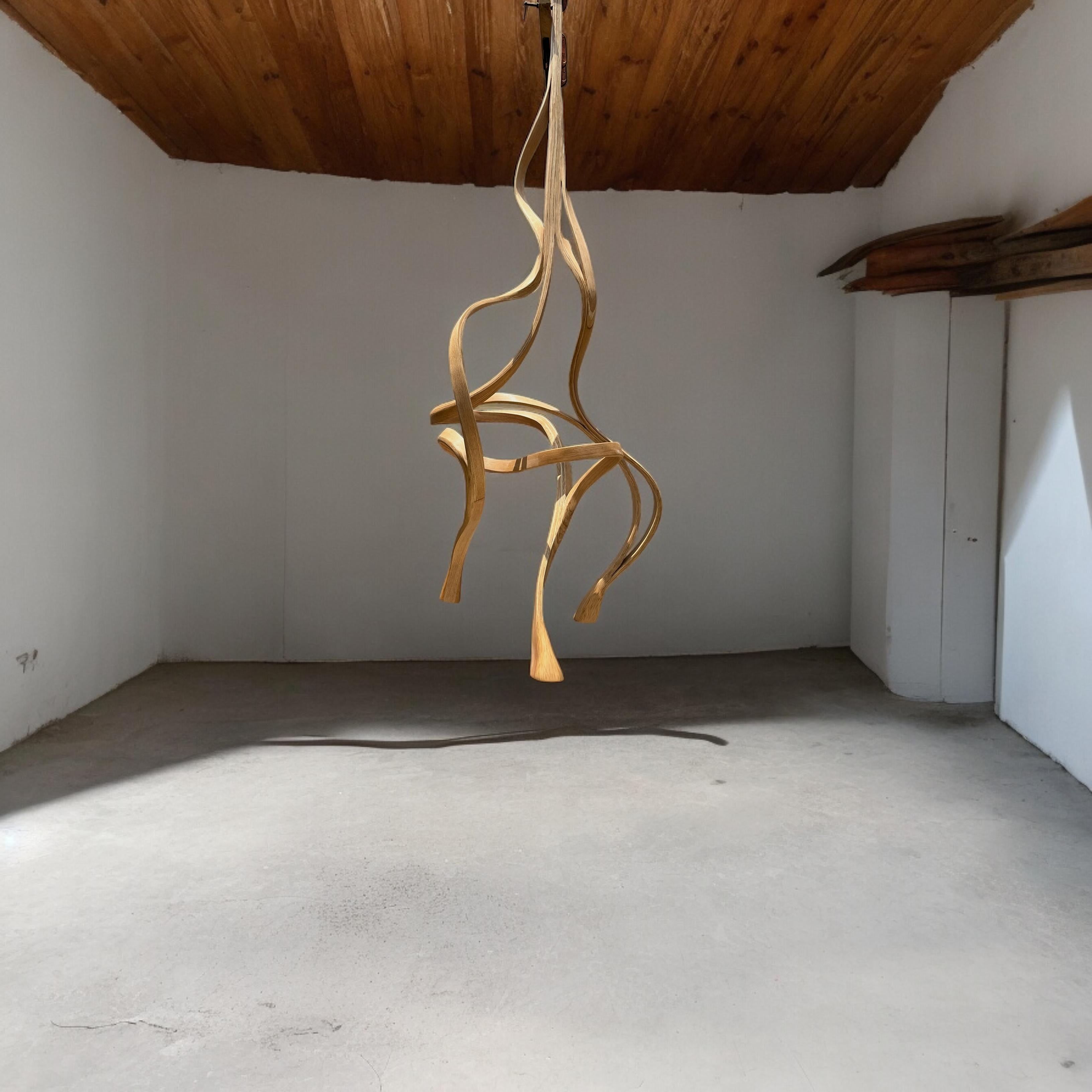 This piece is a pendant styled lighting piece with down lights installed at each of its three ends. The design initiates from a single point and spreads as it flows in an abstract form.

It is a highly customizable piece; the height can be increased