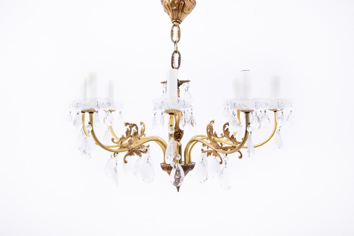 Chandelier, Northern Europe, mid 20th century.

Very good condition.

dimensions: height 59 cm / diameter 67 cm