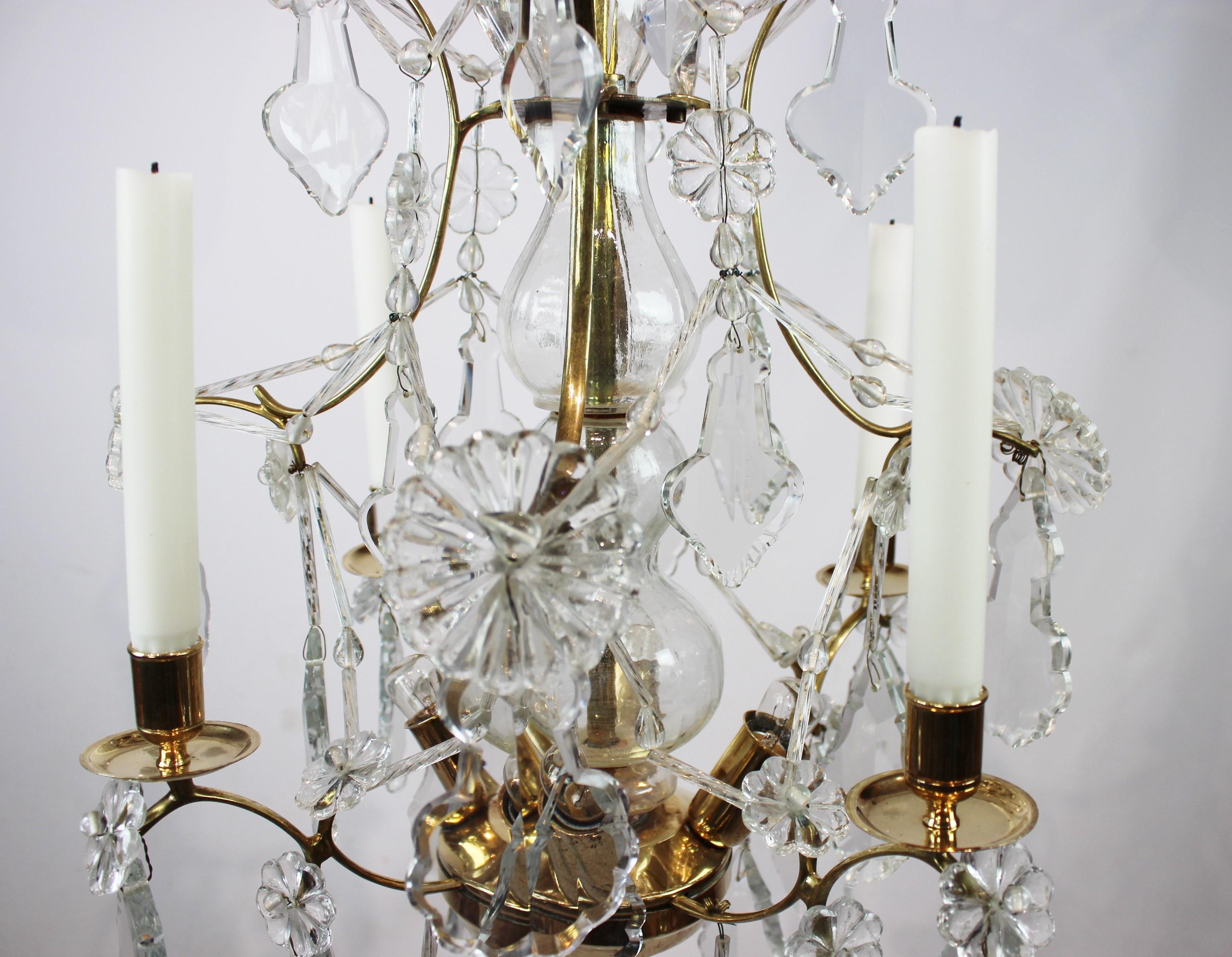 French Provincial Chandelier of Brass and Polished Prisms from France, circa 1920s