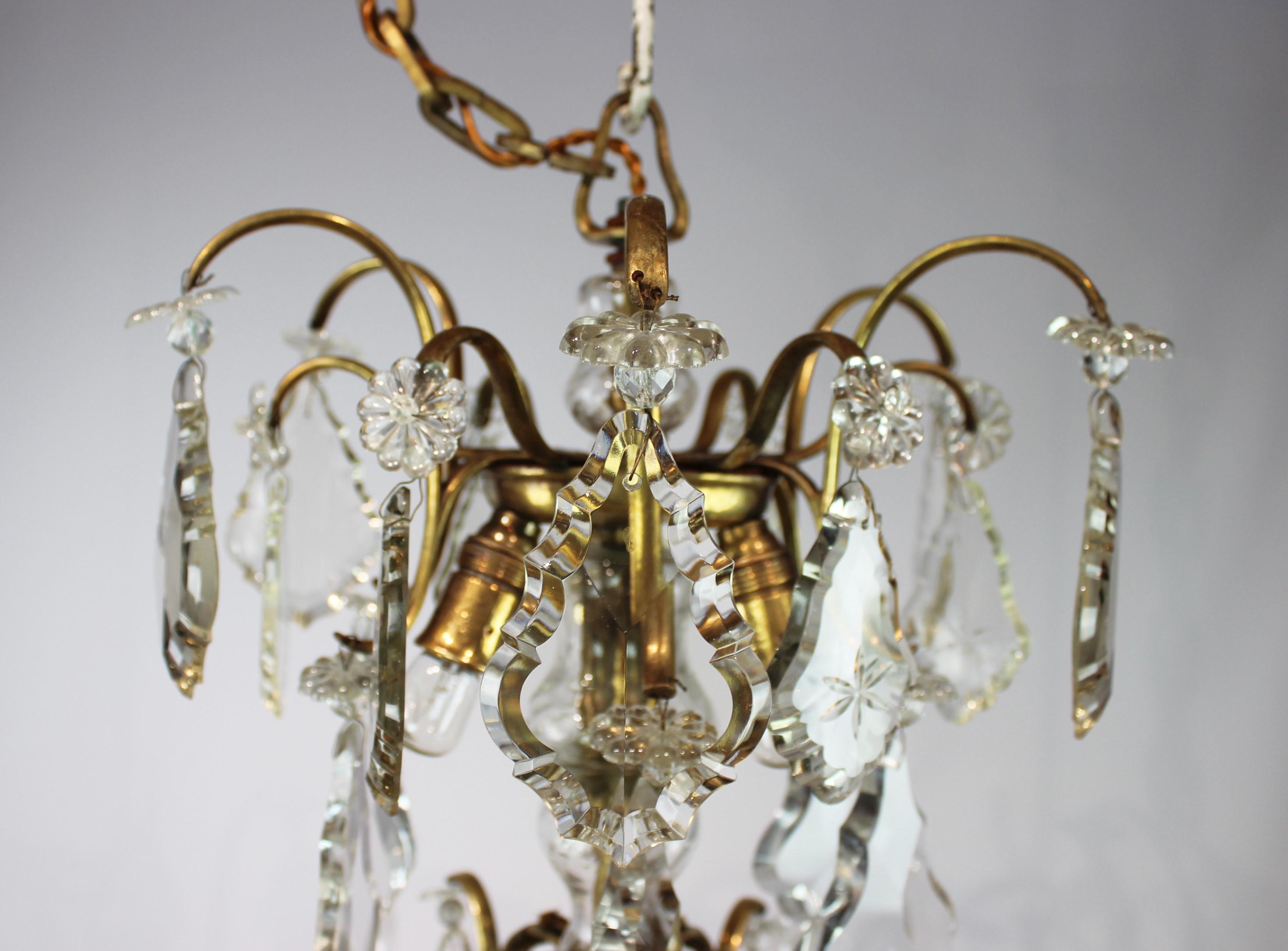 Early 20th Century Chandelier of Brass and Polished Prisms from France, circa 1920s