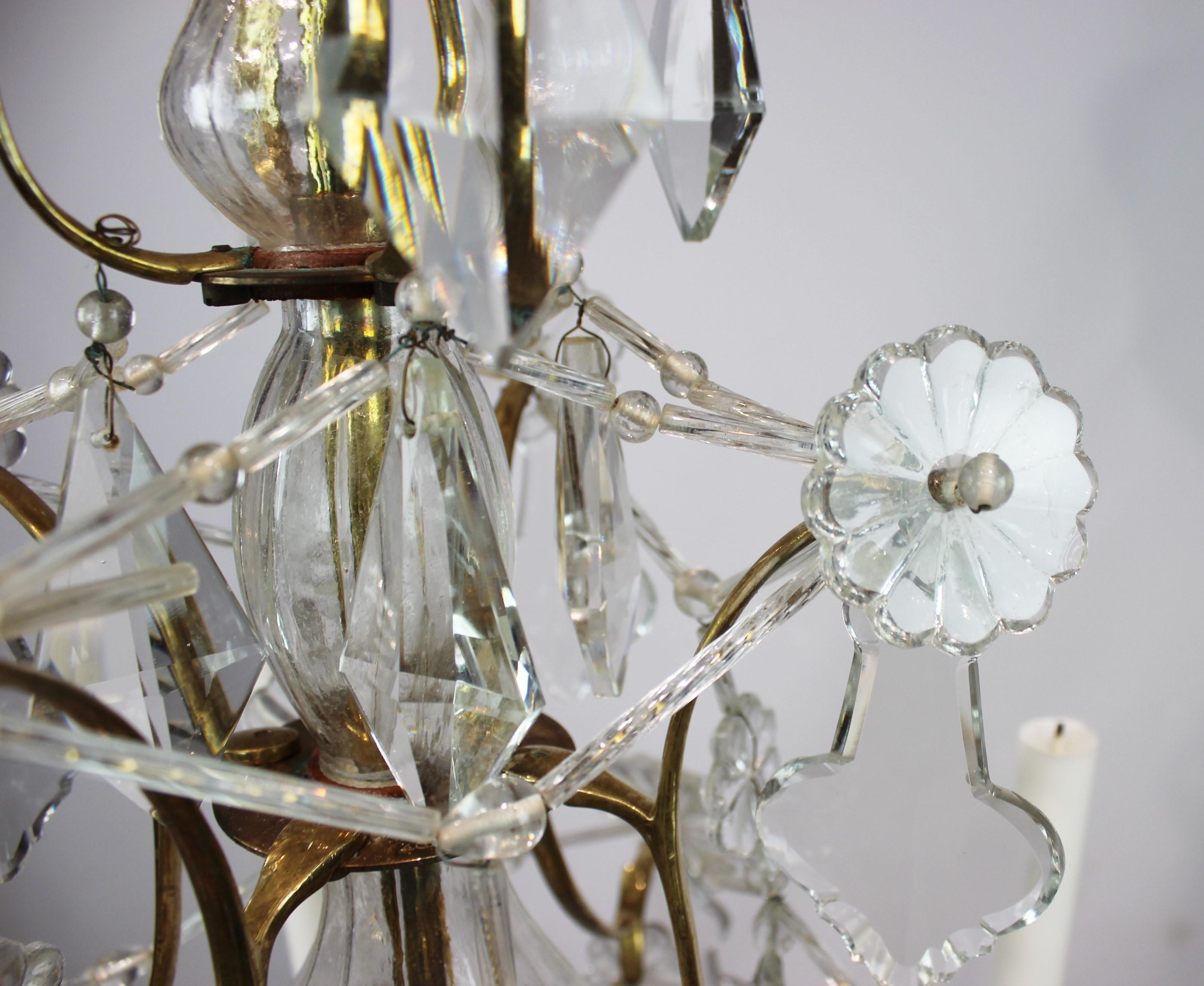 Early 20th Century Chandelier of Brass and Polished Prisms from France, circa 1920s