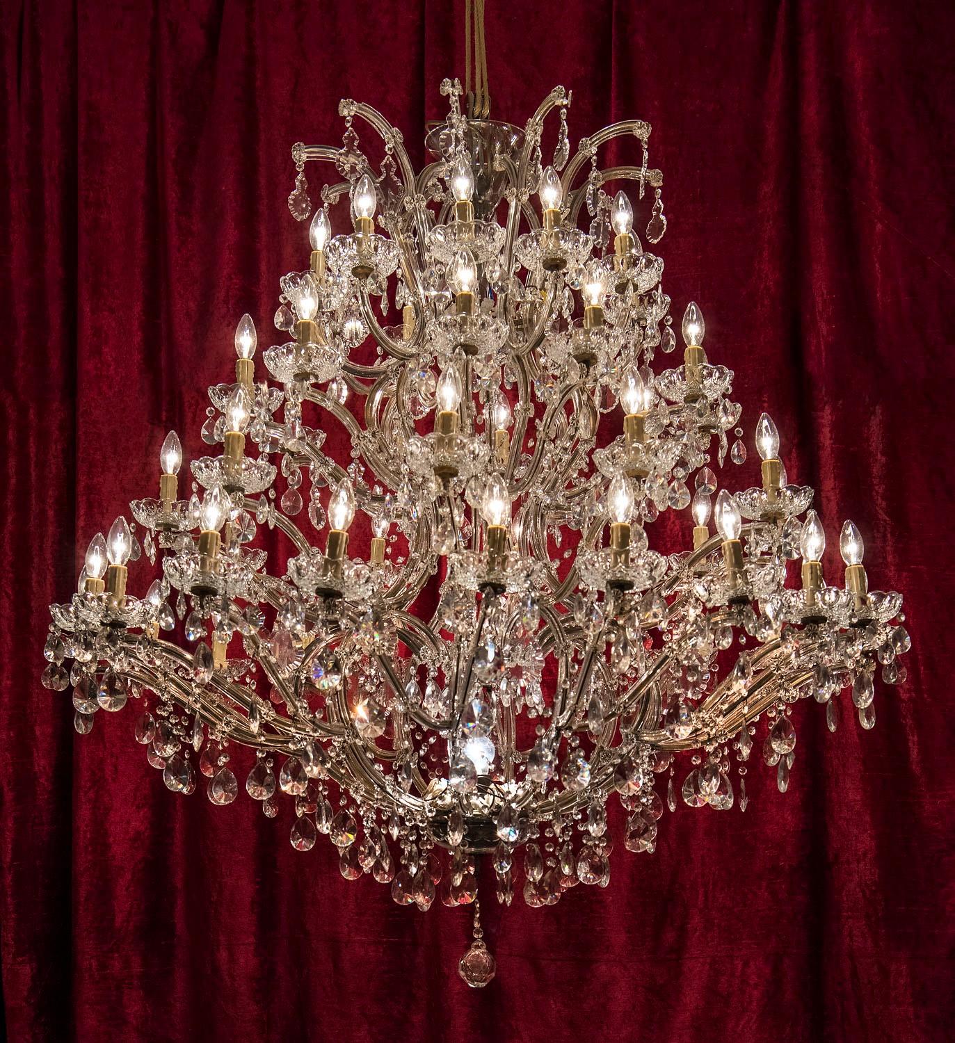 Large Crystal Chandelier of the Extra Class

Opulent chandelier for large rooms or halls.
Hand cut, Bohemian crystal, restored and complete, the original wiring is largely preserved.
Newly electrified according to VDE (german standard, works for EU