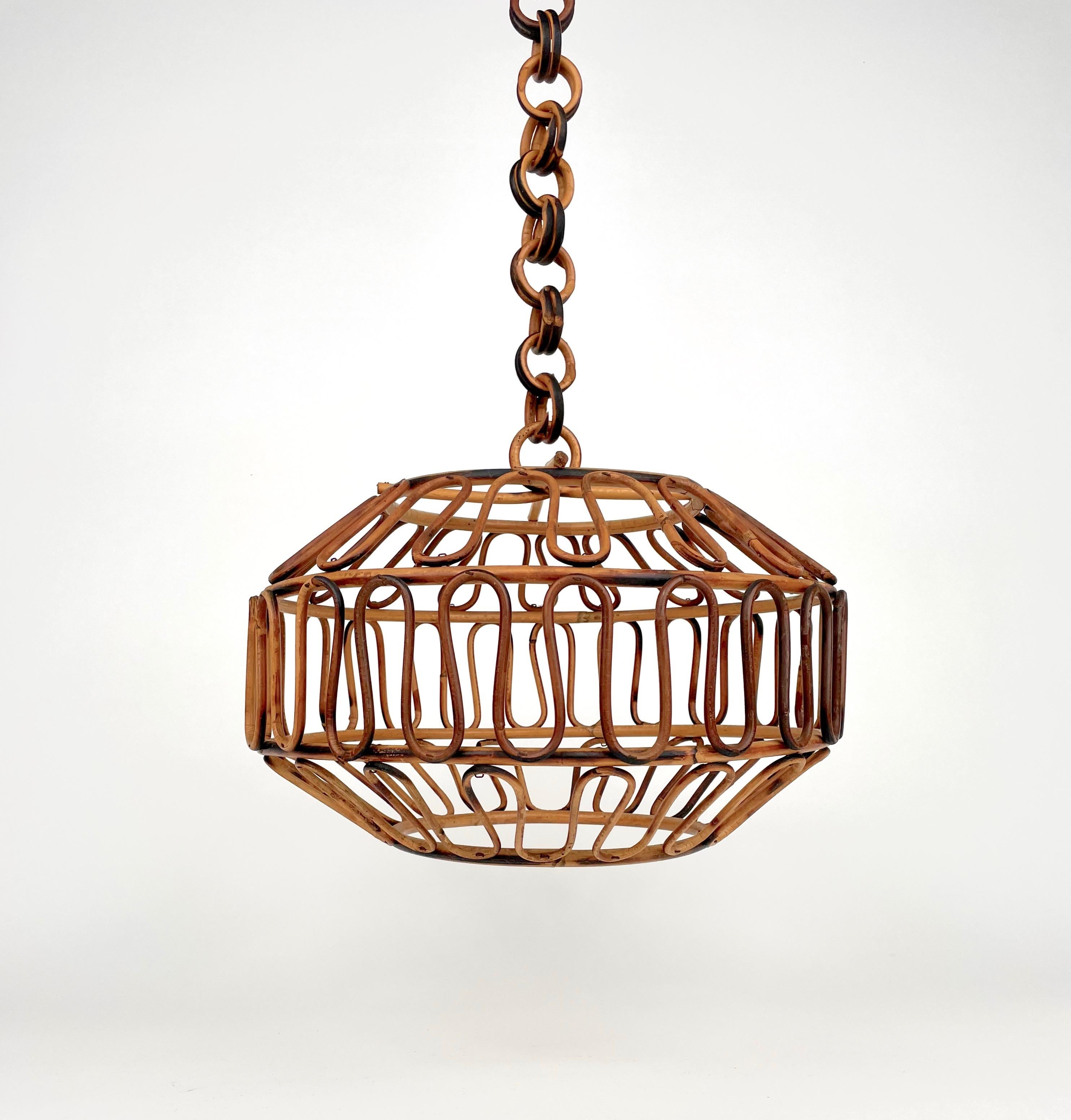 Chandelier in bamboo and rattan with chain made in Italy in the 1960s.