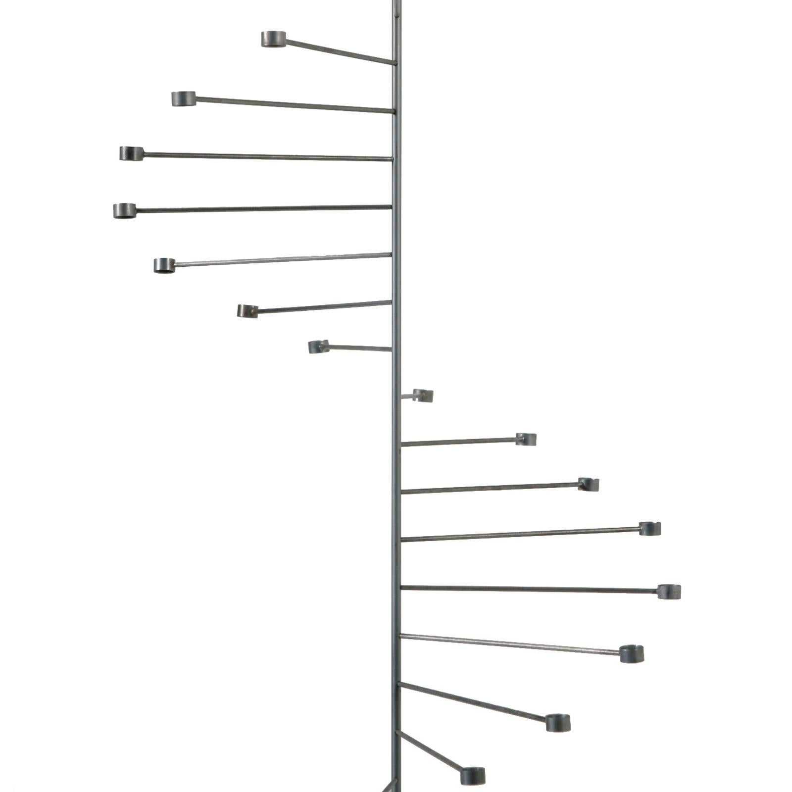 A sculptural steel candelabrum for 32 candles. Designed by Poul Kjærholm in 1956, made by E. Kold Christensen, Denmark.