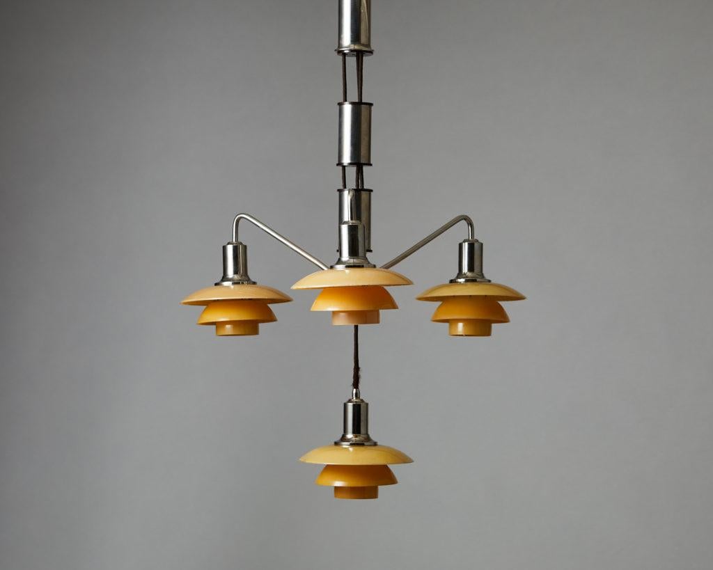 Nickel-plated brass and original frosted painted glass.

Provenance: From a private Danish collection.

Example made in the mid 1930s.

Poul Henningsen’s lamp designs are characterised by their innovative distribution of light. It was Henningsen’s
