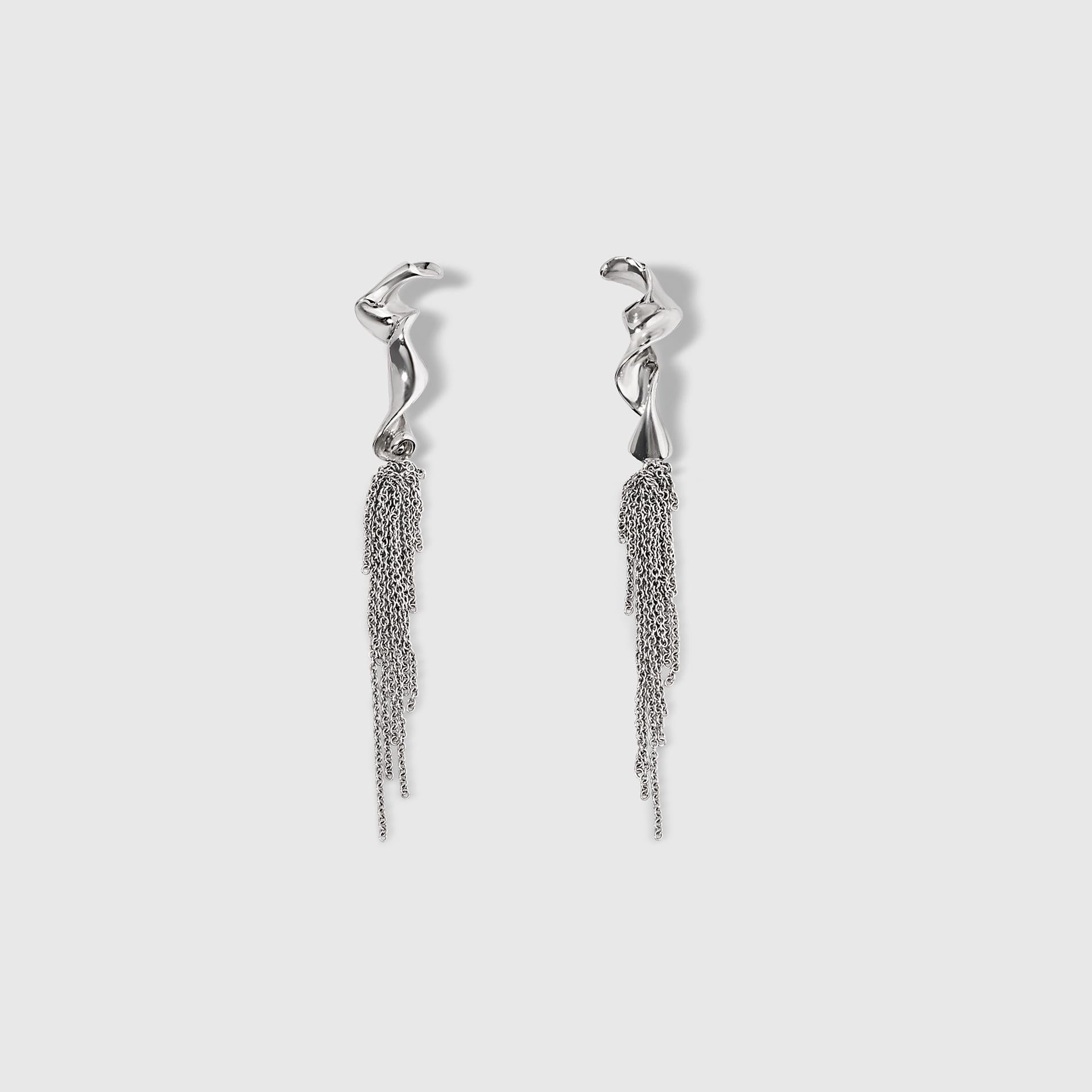 Sculptural Modern Couture 14K White Gold Earrings with Gold Chain Fringe Detail
Approximately 3” in length. These delicate and sculptural earrings can go from day to night.  Curving sculptural earrings with high polished finish.  Handmade in Los
