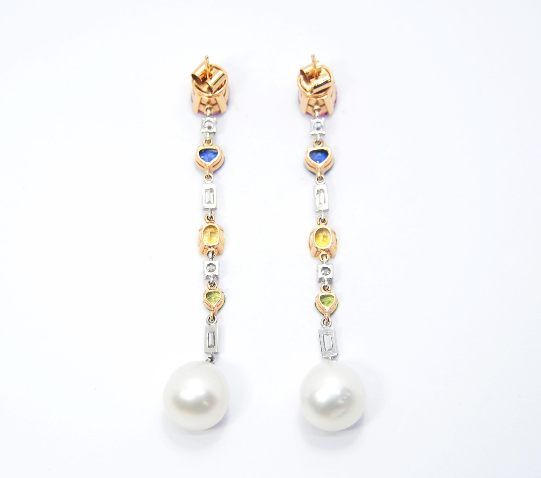 Irama Pradera is a Young designer from Spain that searches always for the best gems and combines classic with contemporary mounting and styles. 
The earrings are made of yellow and white 18kt gold and the diamonds and colored gems come  in four