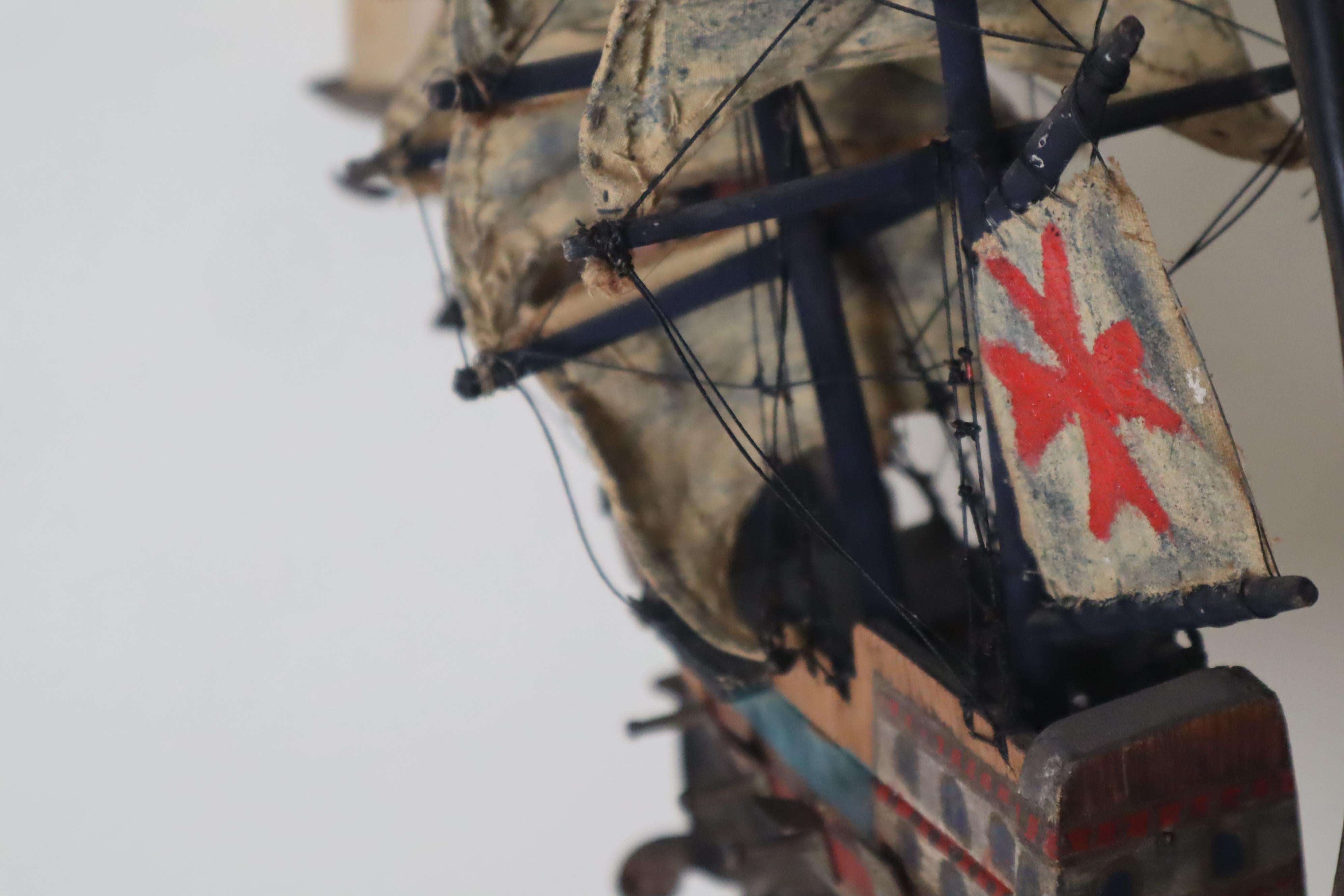 This beautiful chandelier is a unique maritime collector's item that also complements a modern interior design. At its heart, you'll find a handcrafted wooden Spanish galley, lovingly crafted to bring warmth and comfort to your home. The chandelier