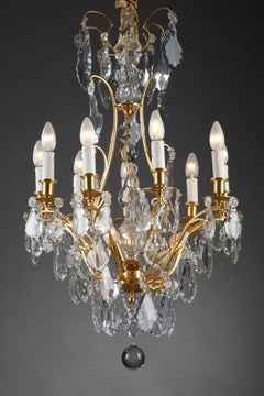 Chandelier with Eight Arms of Lights in Gilded Bronze and Pendants