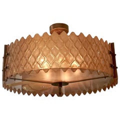 Lampadario con parti dorate di Murano intorno