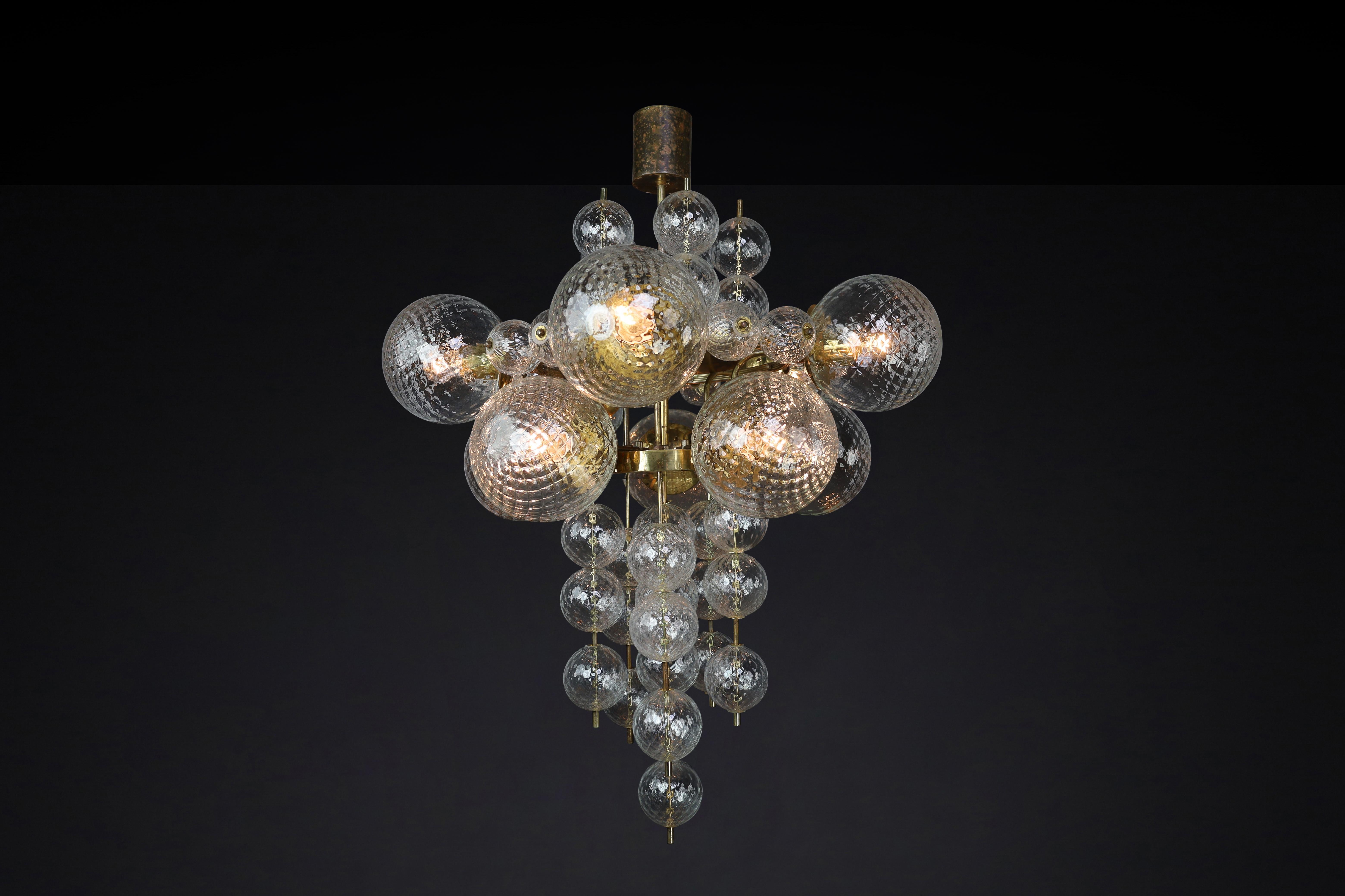 Czech  Chandelier with Patinated brass fixture and hand-blowed glass globes  CZ 1960s For Sale