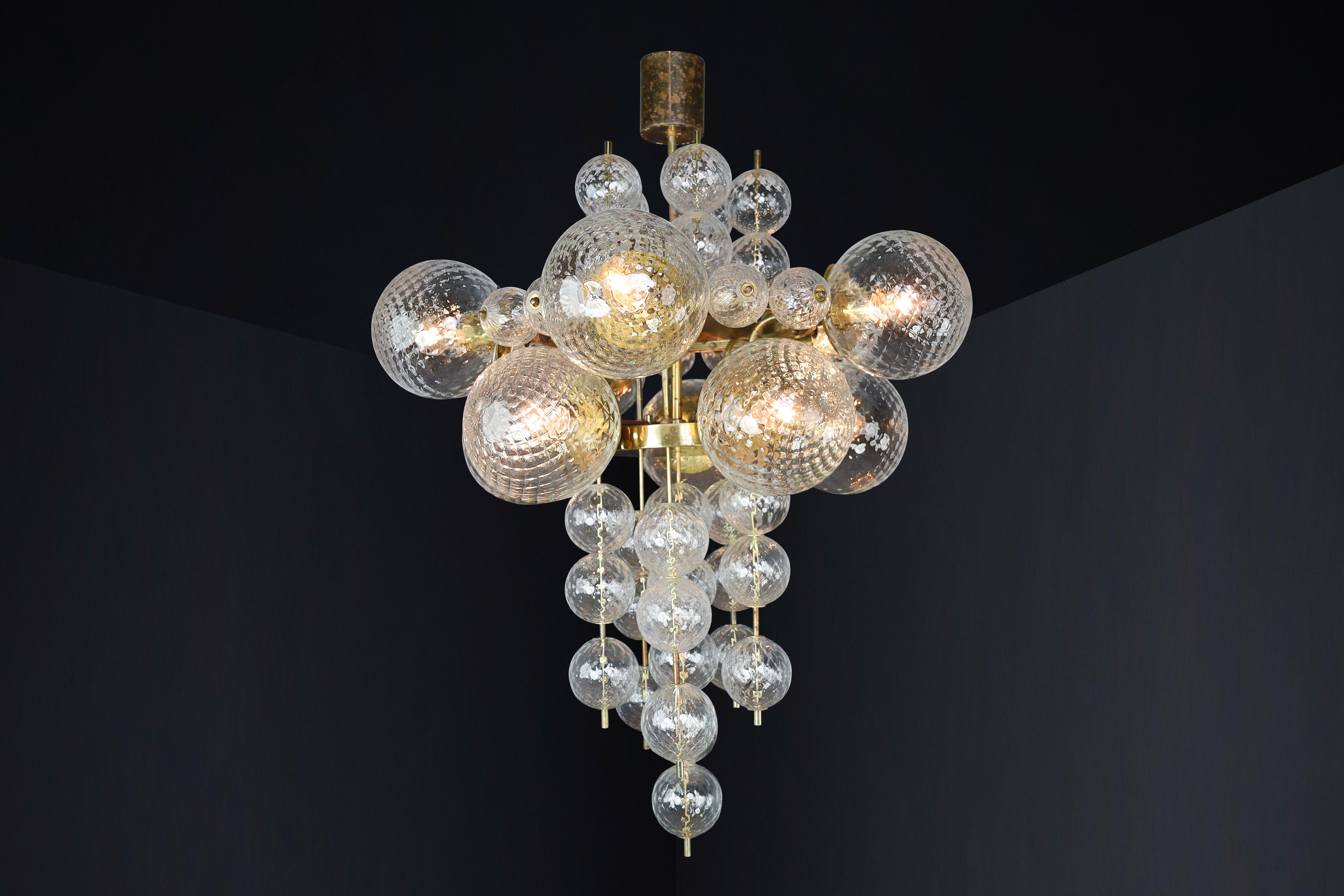  Chandelier with Patinated brass fixture and hand-blowed glass globes  CZ 1960s In Good Condition For Sale In Almelo, NL