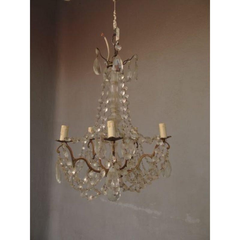 Chandelier pendants and garlands with 6 lights, diameter 47 cm for a height of 62 cm.

Additional information: 
Material: Bronze, glass & crystal
Style: 1900 early 20th century.