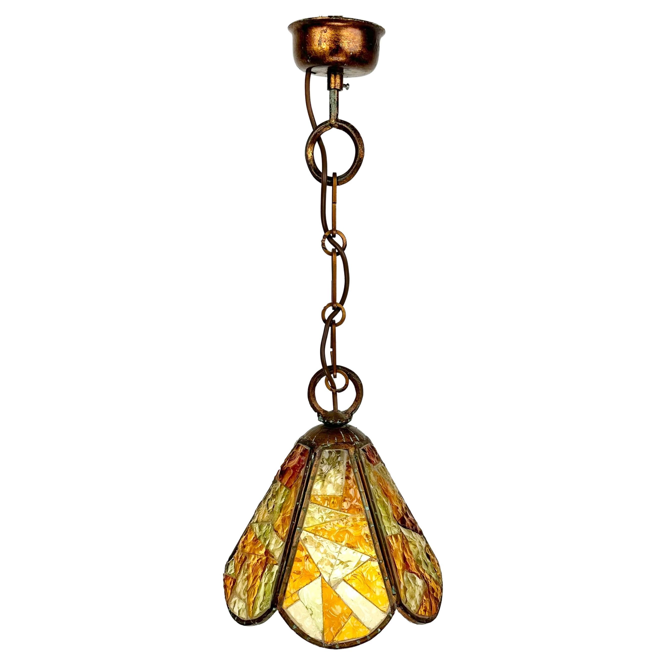 Beautiful chandelier in wrought iron and multicolor art glass produced by Longobard.

Made in Italy in the 1970s.