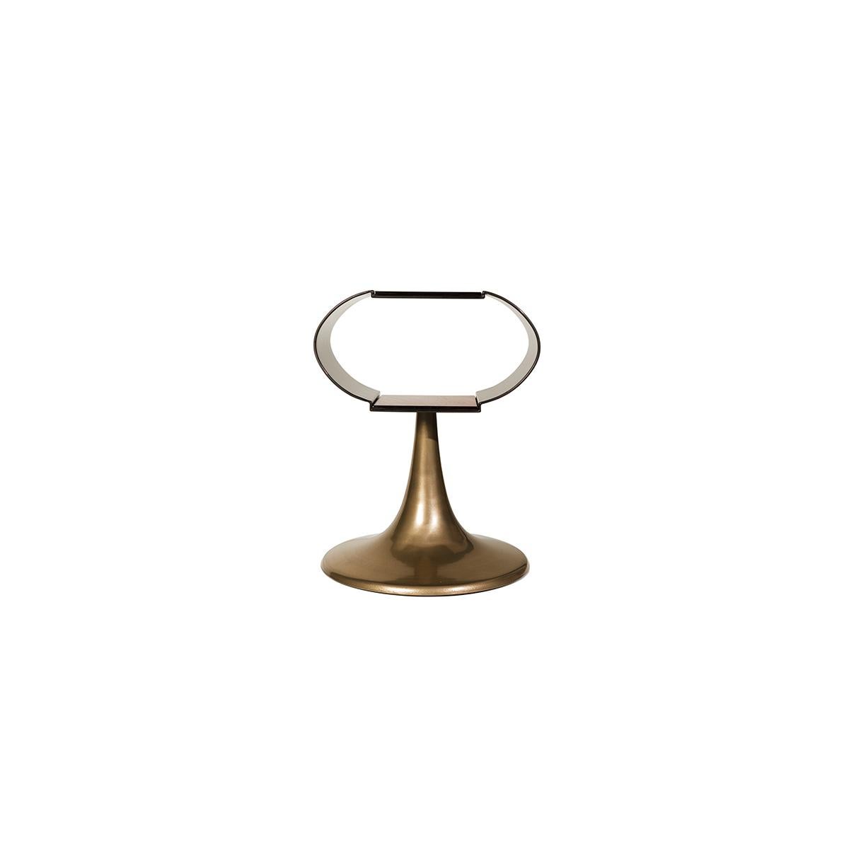 Handcrafted pedestal base design table made from bronze powder resin accented molded liquid metal. The open curved ellipse design of the tabletop creates a open effect with two parallel wood veneer surfaces.