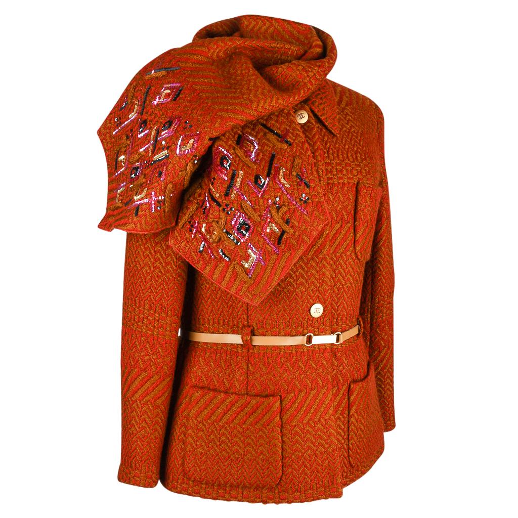 Guaranteed authentic Chanel 00A sensational jacket and marching scarf that can be worn as a myriad of different looks.
Brick toned red and camel with intricate design and texture to the fabric.
3 Button single breast with 4 pockets.
Cuffs have a