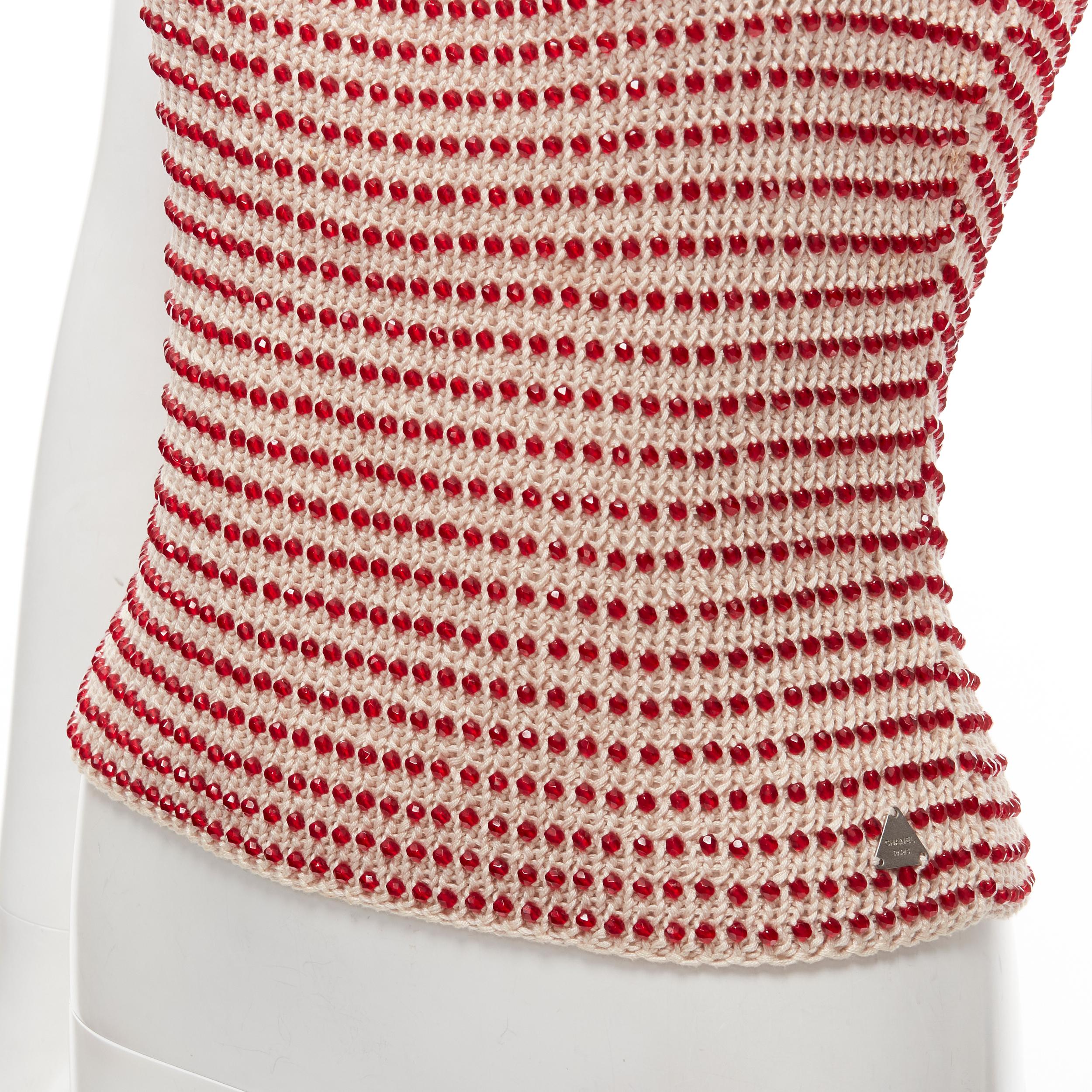 CHANEL 00C ribbed knit cotton red bead embellished CC cami tank FR40 M
Reference: TGAS/C01711
Brand: Chanel
Designer: Karl Lagerfeld
Collection: 2000C
Material: Cotton
Color: Red, Beige
Pattern: Solid
Closure: Pullover
Extra Details: CHANEL PARIS