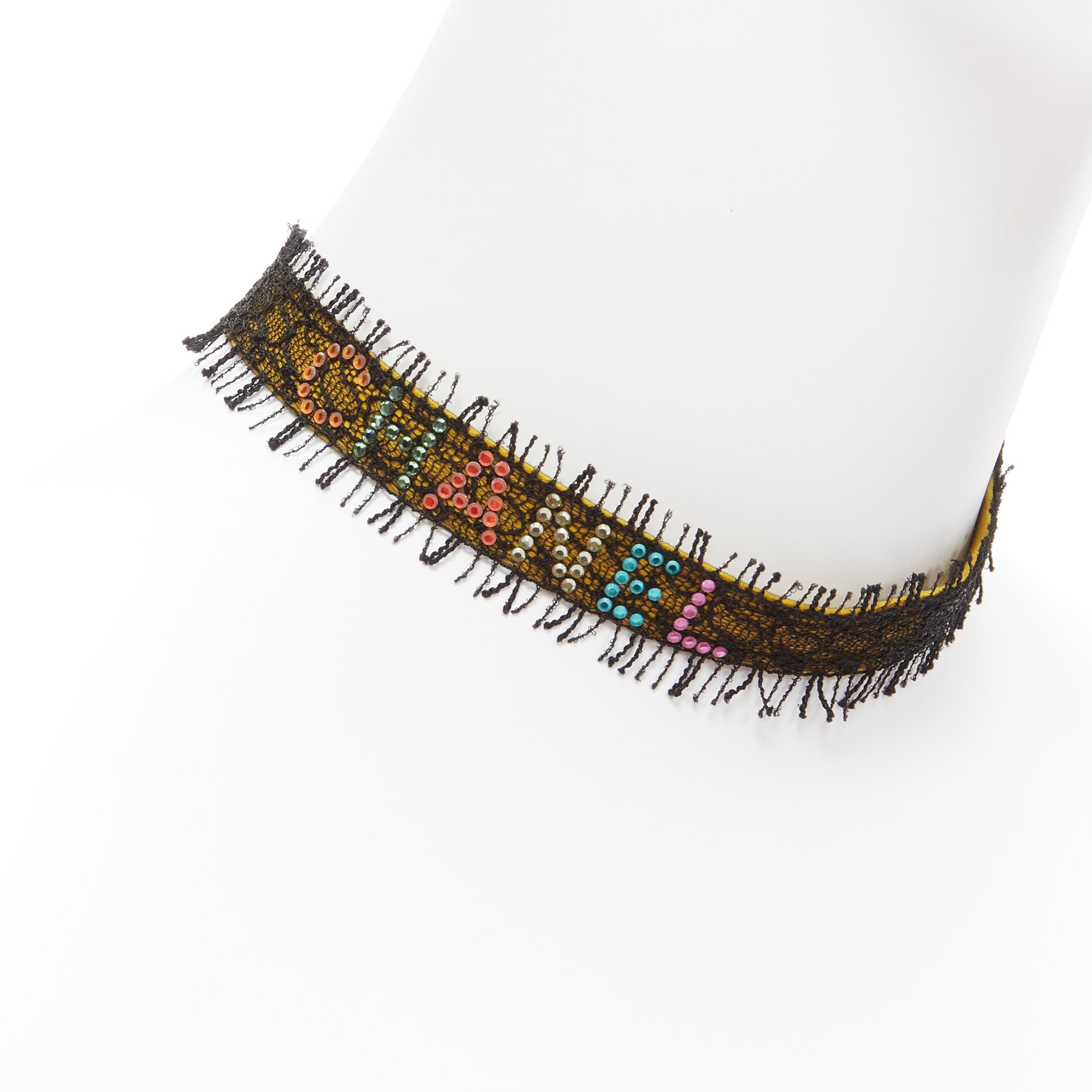 CHANEL 00T rainbow crystal CC logo black lace yellow suede choker necklace
Reference: TGAS/C02034
Brand: Chanel
Designer: Karl Lagerfeld
Collection: 00T
Material: Metal, Lace
Color: Yellow, Multicolour
Pattern: Lace
Closure: Lobster Clasp
Lining: