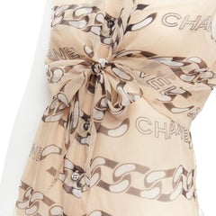 CHANEL 01A Vintage Runway black CC logo chain nude silk front tie blouse FR40 M