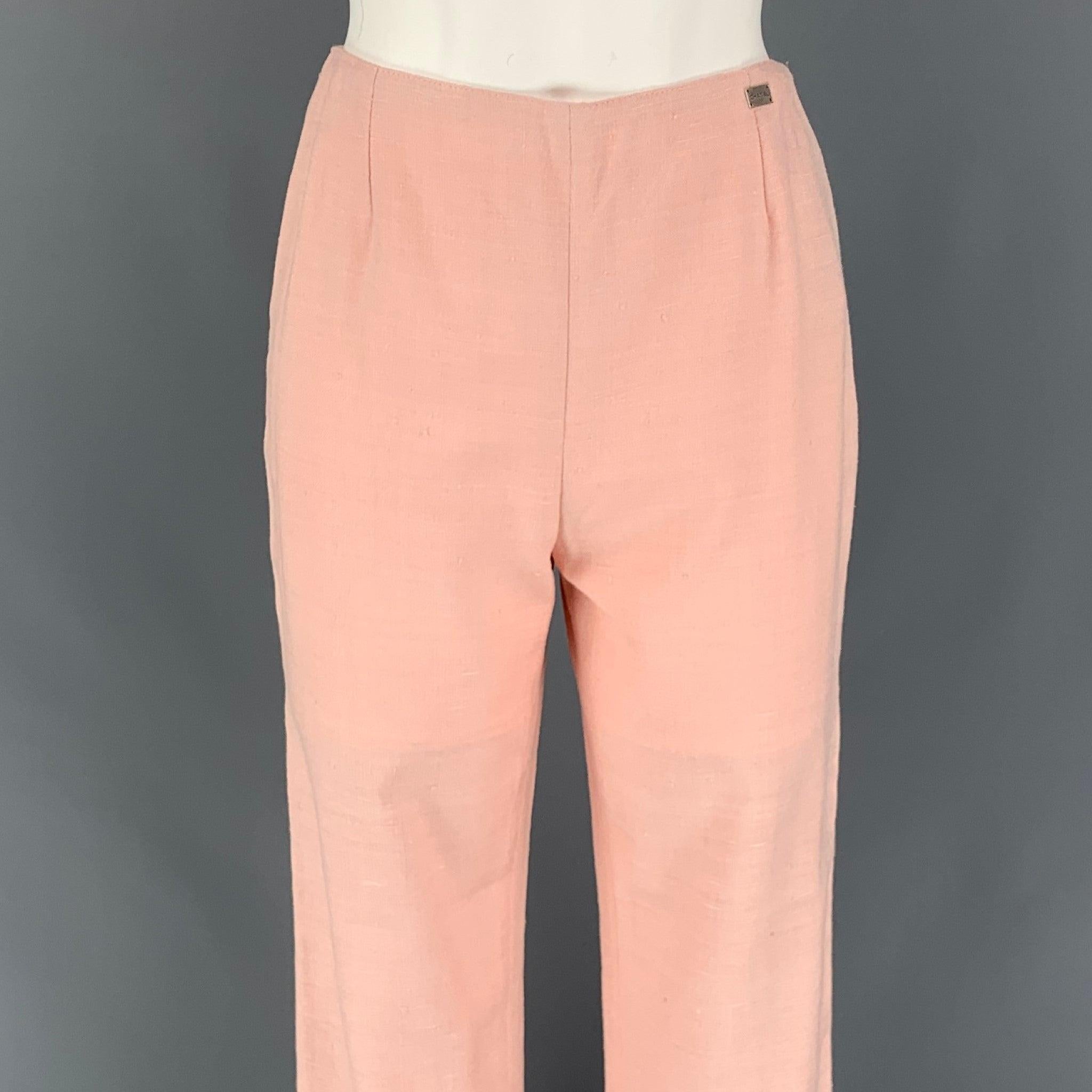 CHANEL casual pants comes in a rose silk featuring a high waist, pleated, logo detail, and a side zipper closure. Made in France.
Very Good
Pre-Owned Condition. 

Marked:   36 

Measurements: 
  Waist: 26 inches  Rise:
10.5 inches  Inseam: 28 inches