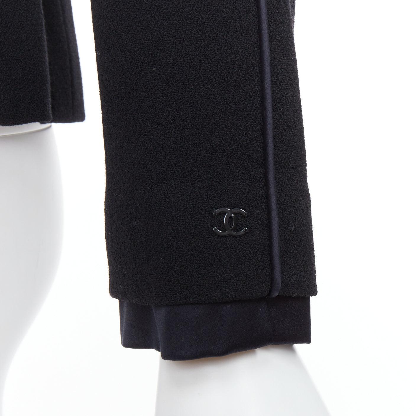 CHANEL 02A 100% wool black satin trim pearl stud buttons jacket FR36 S
Reference: TGAS/E00523
Brand: Chanel
Designer: Karl Lagerfeld
Collection: 02A
Material: Wool
Color: Black
Pattern: Solid
Closure: Button
Lining: Black Silk
Extra Details: Pearl
