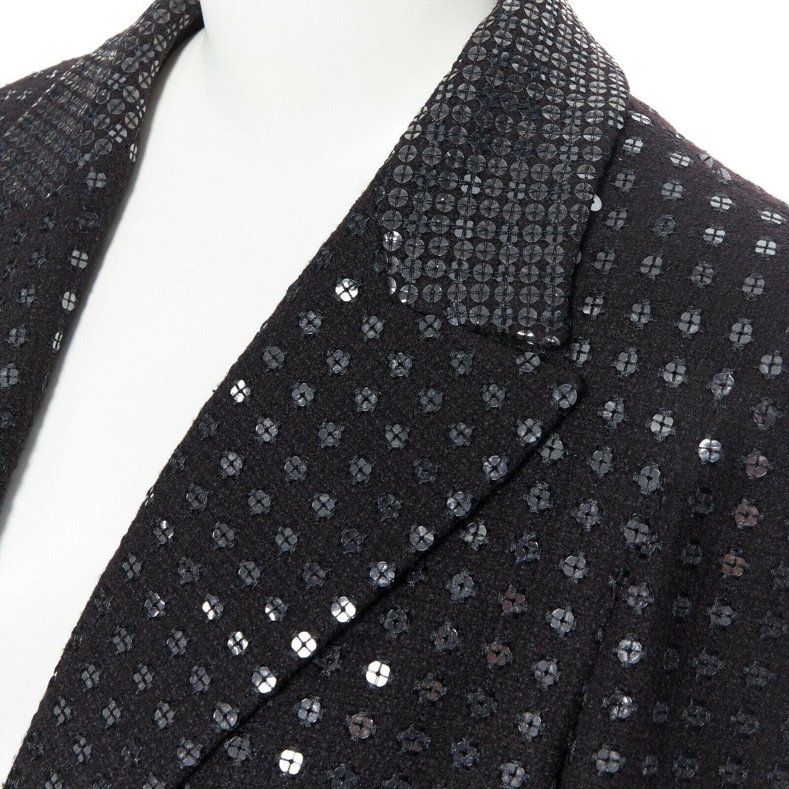 CHANEL 02C black sequinned tweed bejewel buttons swallowtail tuxedo jacket FR44
Brand: CHANEL
Designer: Karl Lagerfeld
Collection: 02C
Model Name / Style: Tweed jacket
Material: Wool
Color: Black
Pattern: Solid with sequins embellishments
Closure: