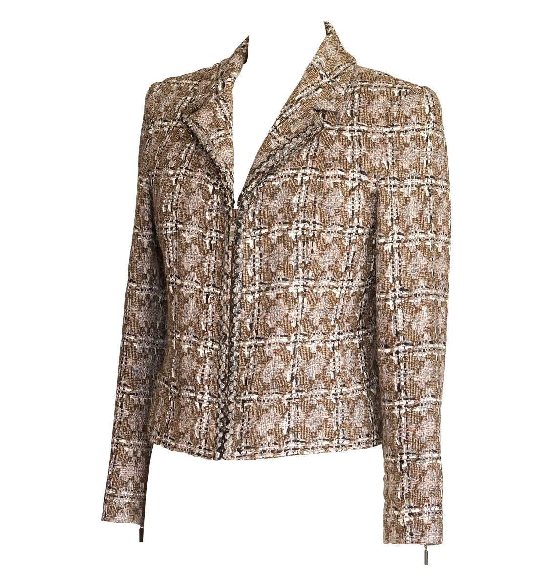 Guaranteed authentic Chanel 03P beautiful tweed suit in shades of taupe, gray, black, cream and soft touches of pink.
Gray and black braided tweed along zippers in front and cuffs.
2 front slot pockets.
Skirt has braided tweed around waist and down