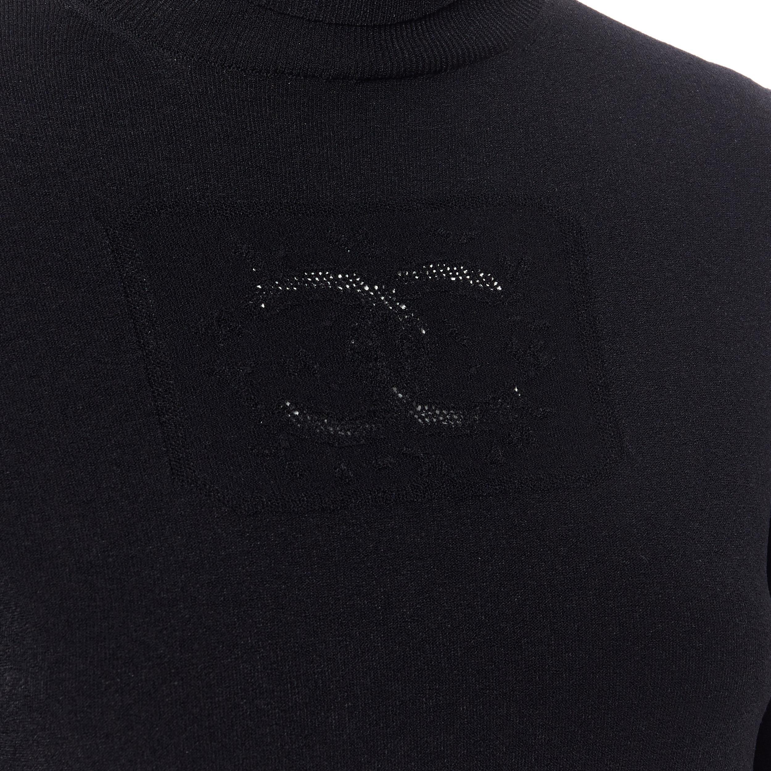 CHANEL 03P viscose knit CC logo front turtleneck 3/4 sleeve sweater top FR40 M
Brand: Chanel
Designer: Karl Lagerfeld
Model Name / Style: Turtleneck top
Material: Viscose, polyester
Color: Black
Pattern: Solid
Extra Detail: 3/4 Sleeve. Turtleneck