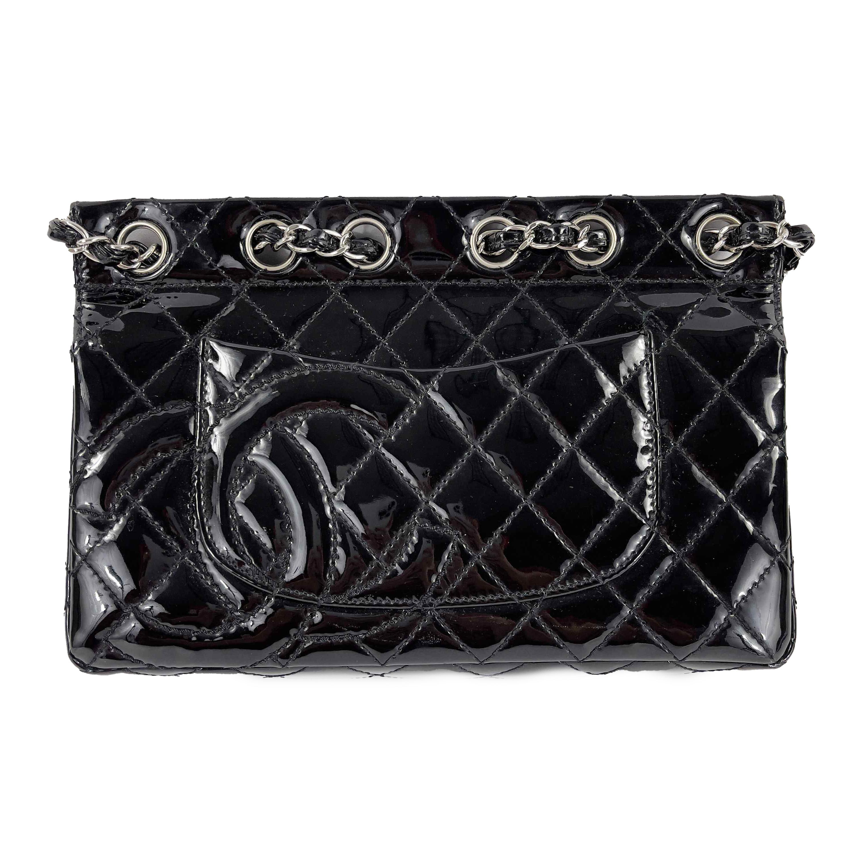 CHANEL 05 Patent Chain Through Flap Bag Quilted - Black / Silver-tone Crossbody

Description

* 2005 Collection
* Seen on Victoria Beckham.
* Patent leather.
* Silver tone hardware.
* Threaded shoulder chain that can be doubled.
* Interior zip