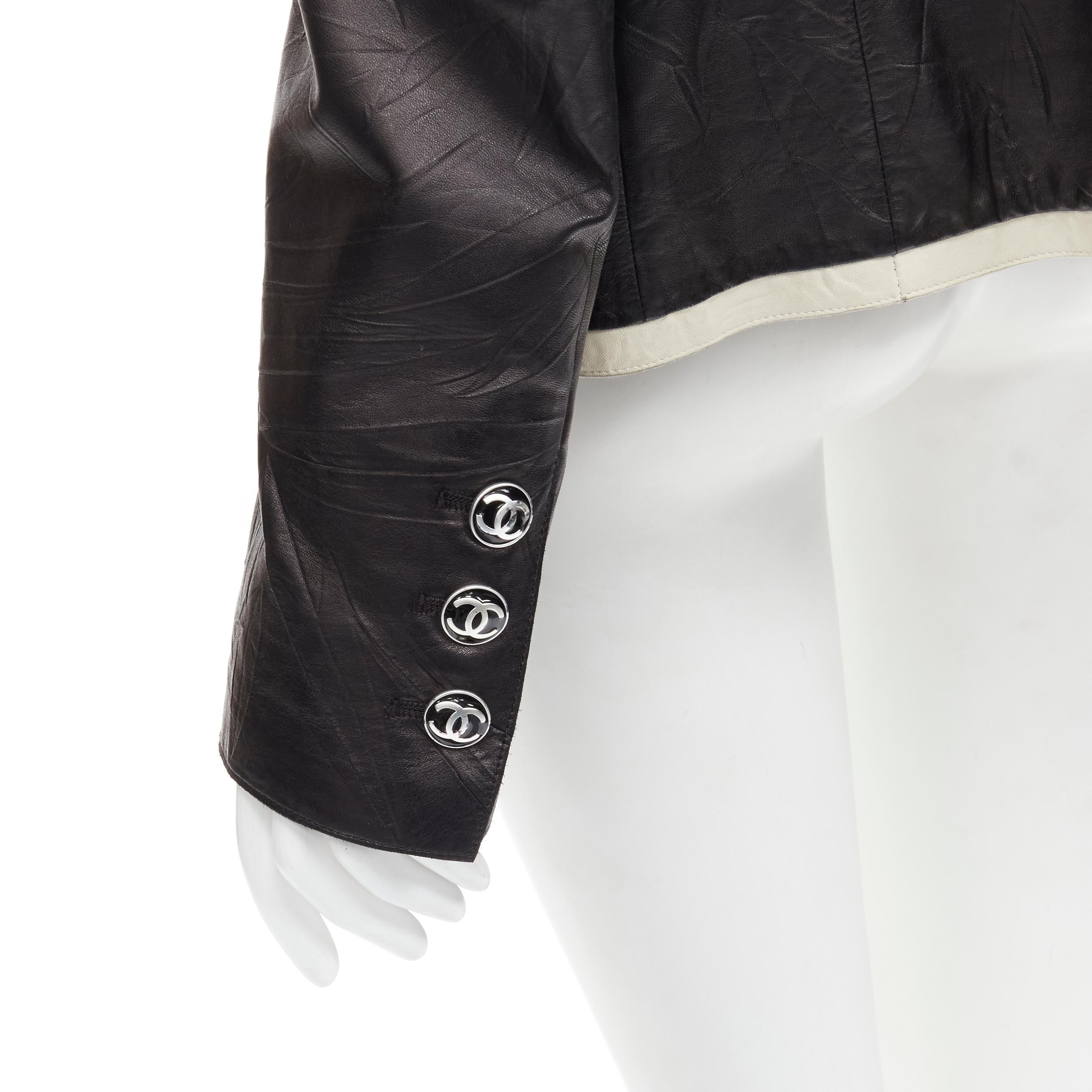CHANEL 05P black crinkled creased lambskin leather 4-pocket jacket FR40 M
Brand: Chanel
Designer: Karl Lagerfeld
Collection: 05P 
Material: Leather
Color: Black
Pattern: Solid
Extra Detail: Pressed crinkled lambskin leather. Cream trim along collar.