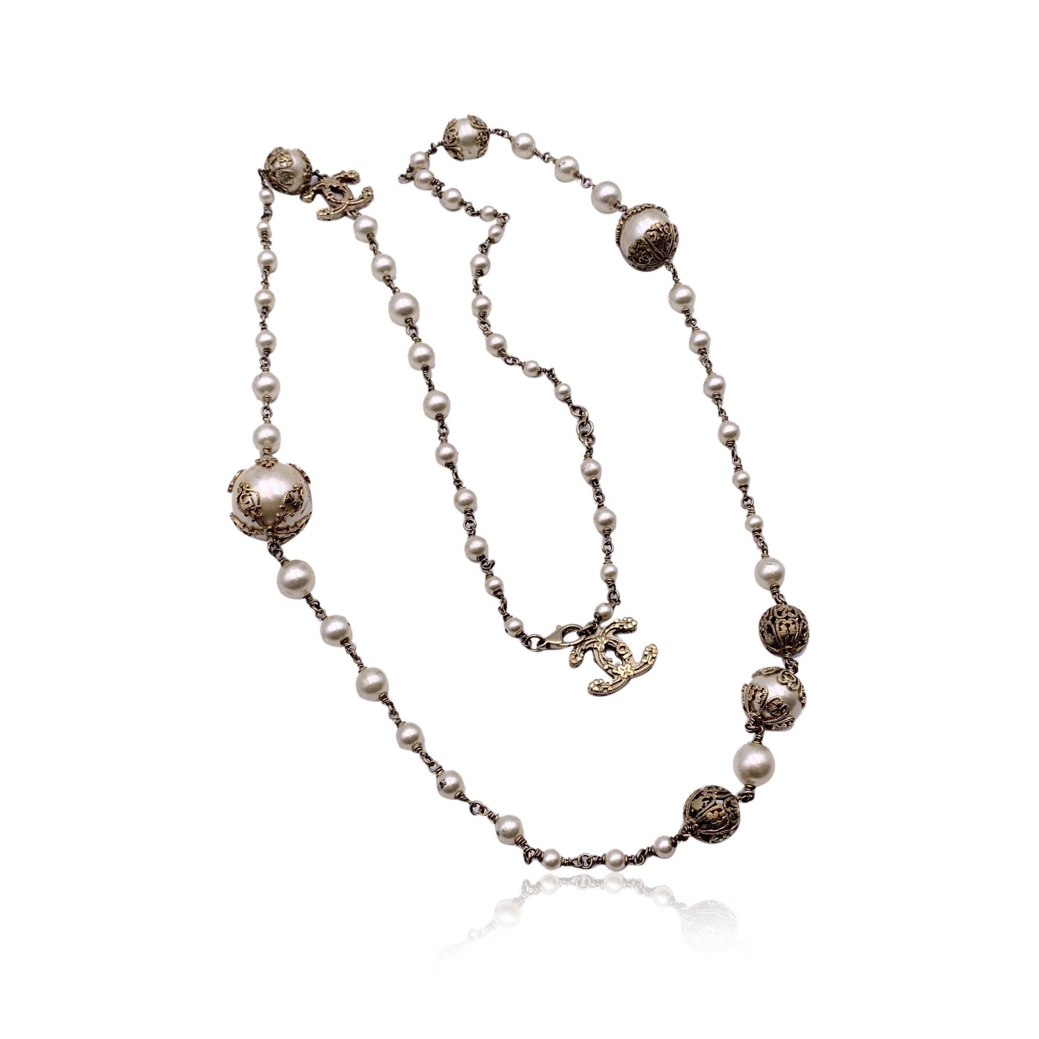 Beautiful Chanel light old metal faux pearl necklace or belt. Multi chain design. It is very versatile and will complete every look, , you can use it long or doubled . Lobster closure. From the 2006 collection. Total lenght: 50 inches - 127 cm.