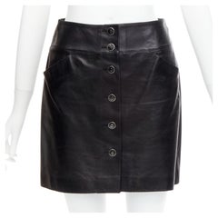CHANEL 06A black lambskin leather CC logo button A-line mini skirt FR34 XS