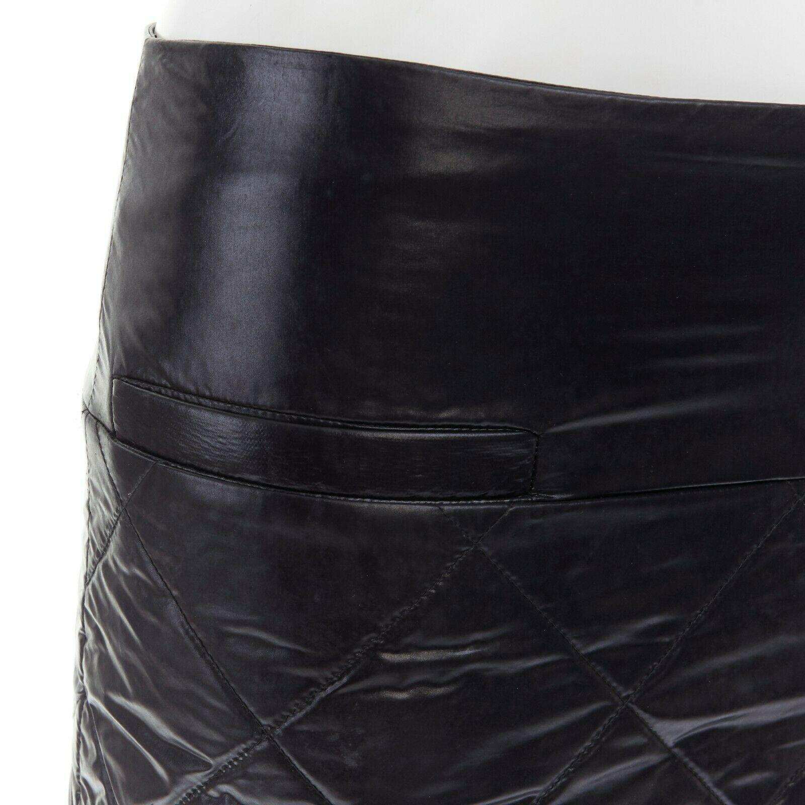 Women's CHANEL 06A black quilted nylon dual pocket CC charm mini skirt FR34 XS