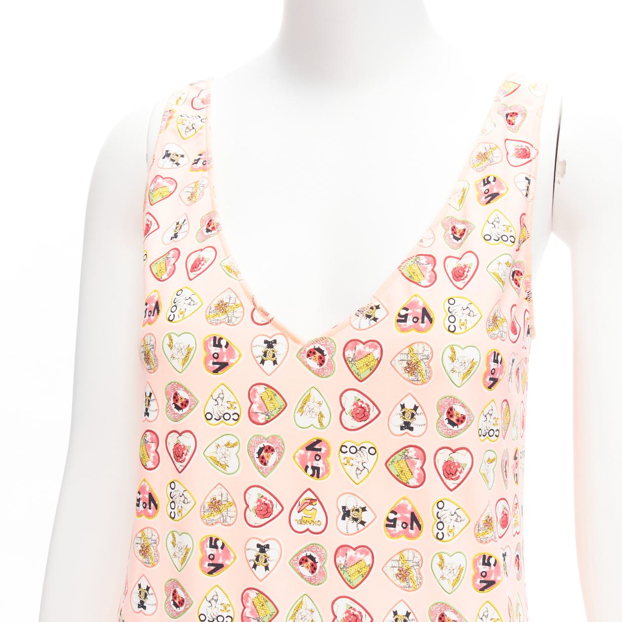 CHANEL 06P Vintage pink Valentino CC Heart Coco charm print V neck mini dress FR38 M
Reference: TGAS/D00385
Brand: Chanel
Designer: Karl Lagerfeld
Collection: 06P
Material: Polyamide, Elastane
Color: Pink
Pattern: Photographic Print
Closure: Slip