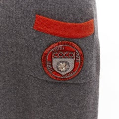 CHANEL 07A 100% Kaschmirgraues und orangefarbenes Strickkleid mit COCO-Logo-Schriftzug FR38 M