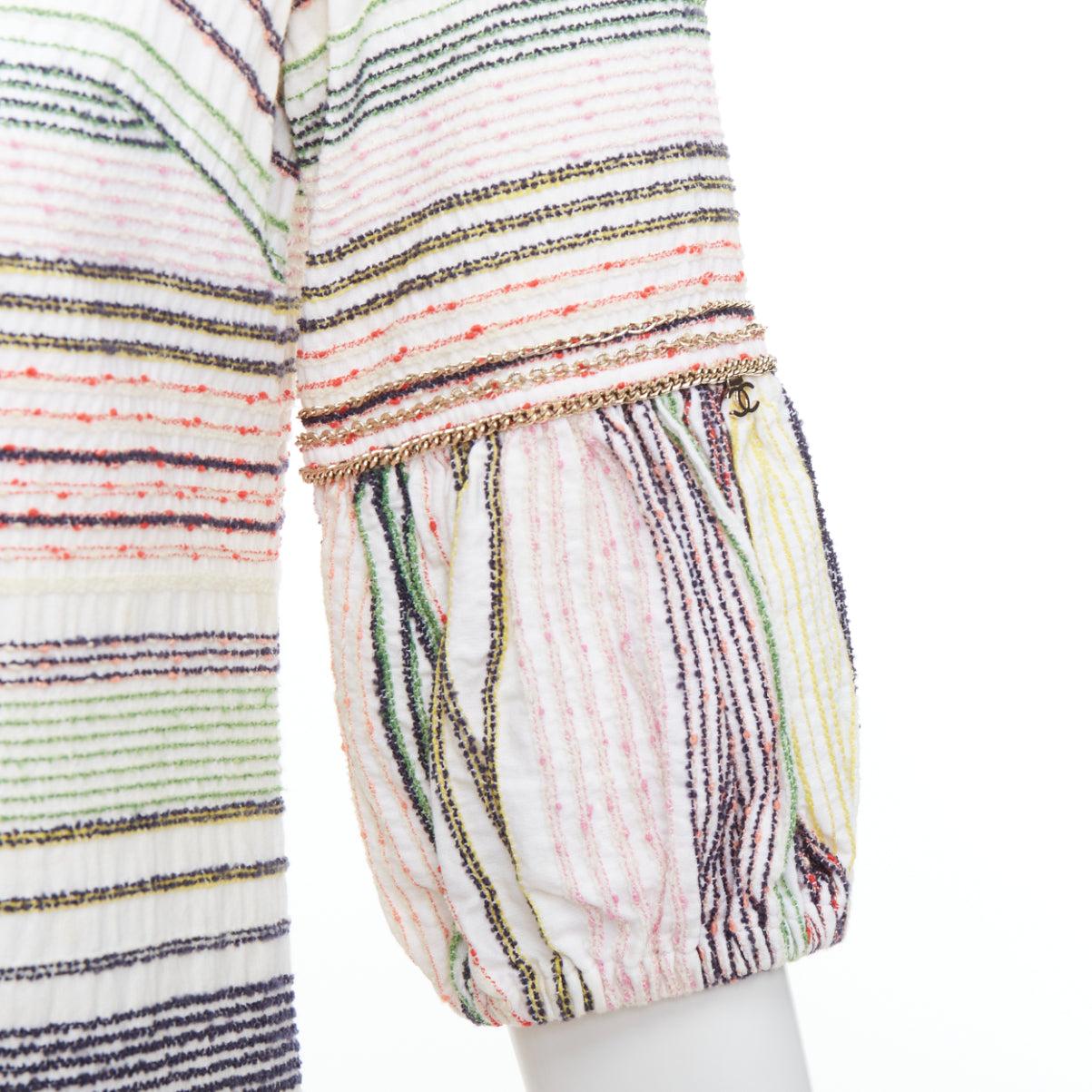 CHANEL 07A Runway white multicolor tweed chain trimmed sleeve dress FR36 S
Reference: TGAS/E00511
Brand: Chanel
Designer: Karl Lagerfeld
Collection: 07S - Runway
Material: Cotton, Wool, Blend
Color: White, Multicolour
Pattern: Striped
Closure: