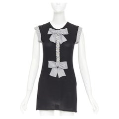 CHANEL 07P Runway black cashmere silk off white bow metal chain dress FR38 M