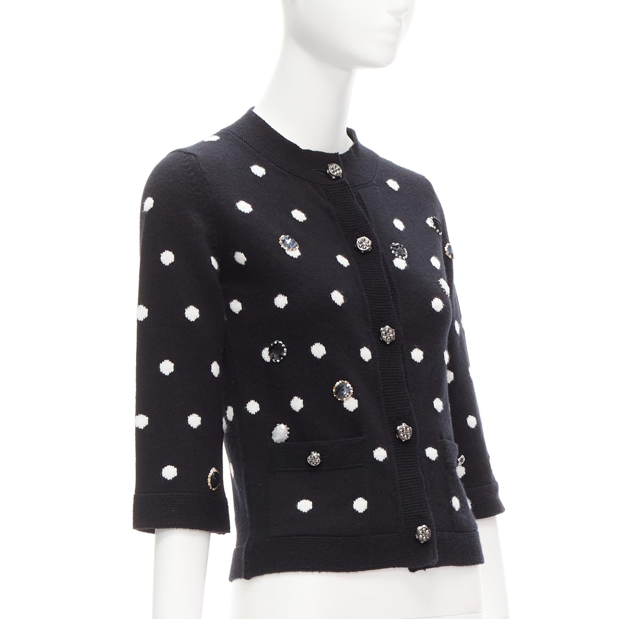 CHANEL 08A 100% cashmere silver embellished black polka dot cardigan FR34 XS
Reference: TGAS/D00895
Brand: Chanel
Designer: Karl Lagerfeld
Collection: 08A
Material: Cashmere
Color: White, Black
Pattern: Polka Dot
Closure: Button
Extra Details: