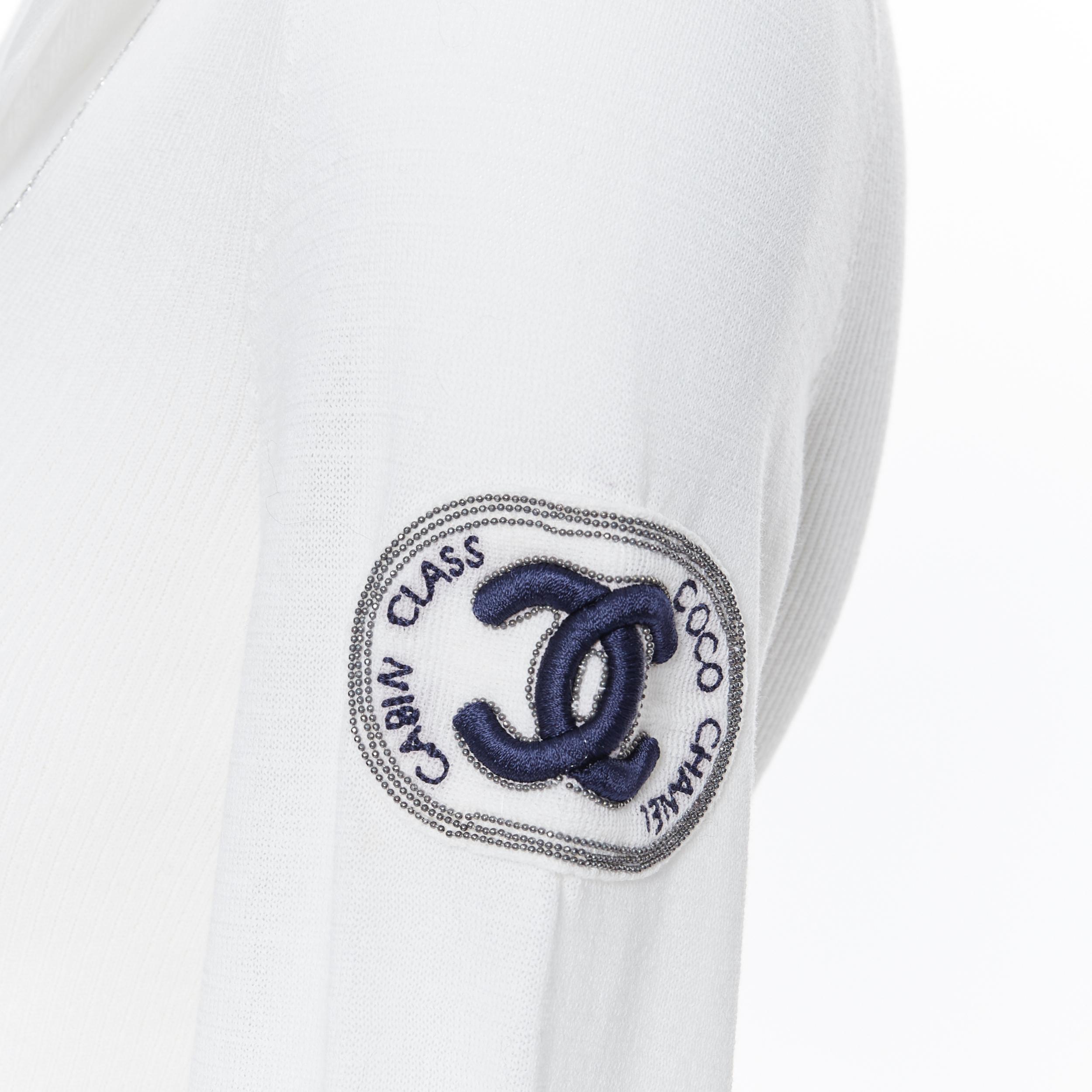 CHANEL 08C Coco Line Cabin Class CC logo embroidery ribbed polo top FR36 XS
Brand: Chanel
Designer: Karl Lagerfeld
Collection: 08C
Model Name / Style: Ribbed top
Material: Cotton, nylon
Color: White
Pattern: Solid
Extra Detail: Ribbed bodice. Lurex