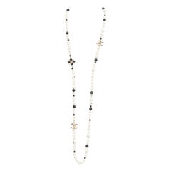 CHANEL 08P black Camelia enamel station faux pearl CC long necklace