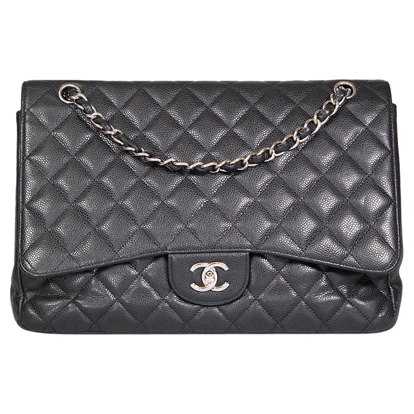 Chanel 
09-
10 Black Caviar Leather Maxi Classic Flap Bag