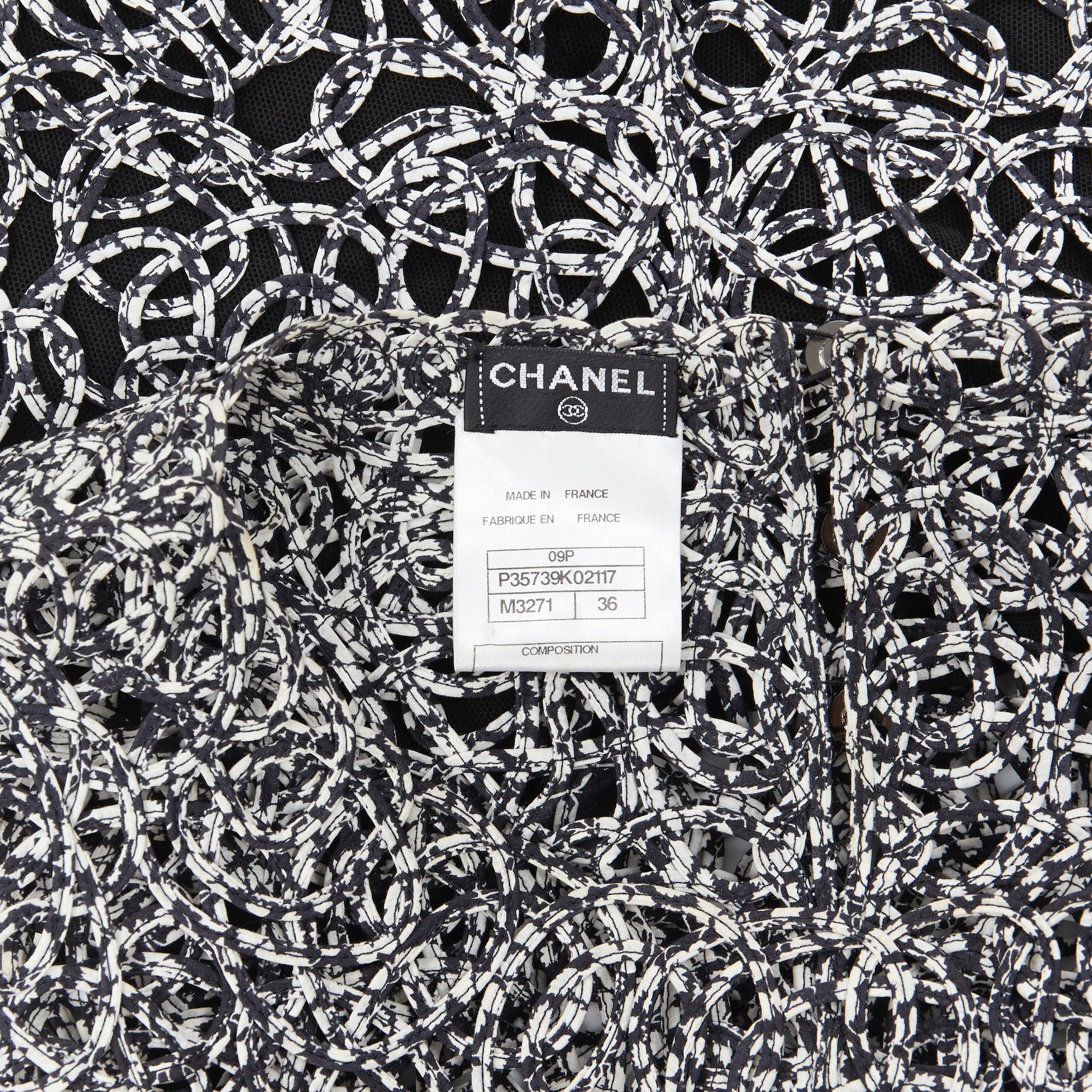 CHANEL 09P chaleco sin mangas con estampado abstracto blanco y negro FR36 5
