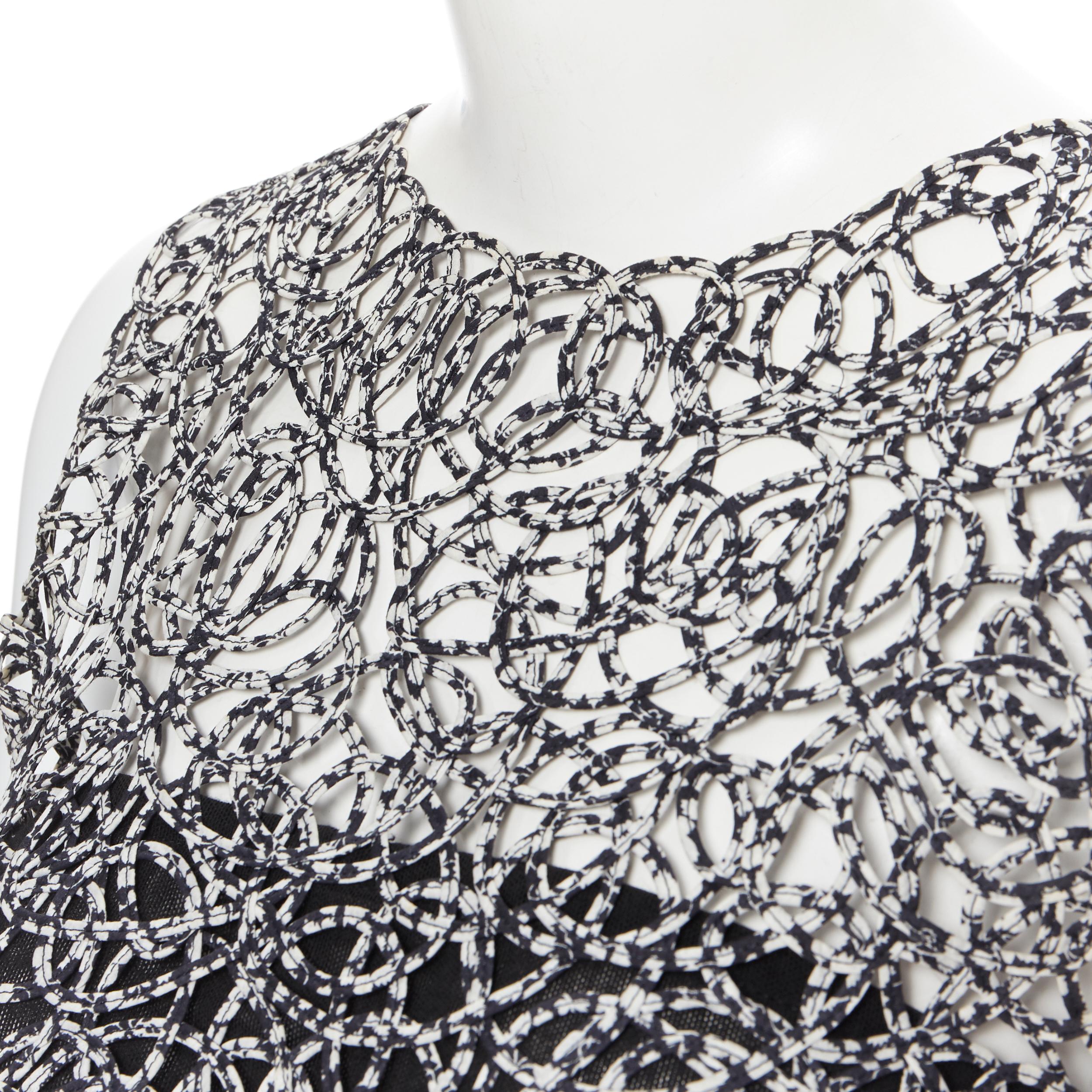 CHANEL 09P chaleco sin mangas con estampado abstracto blanco y negro FR36 Negro